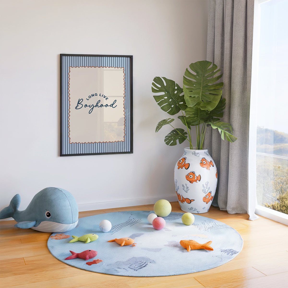 Long live boyhood nursery print in a black frame in a playroom with an ocean rug and whale plush