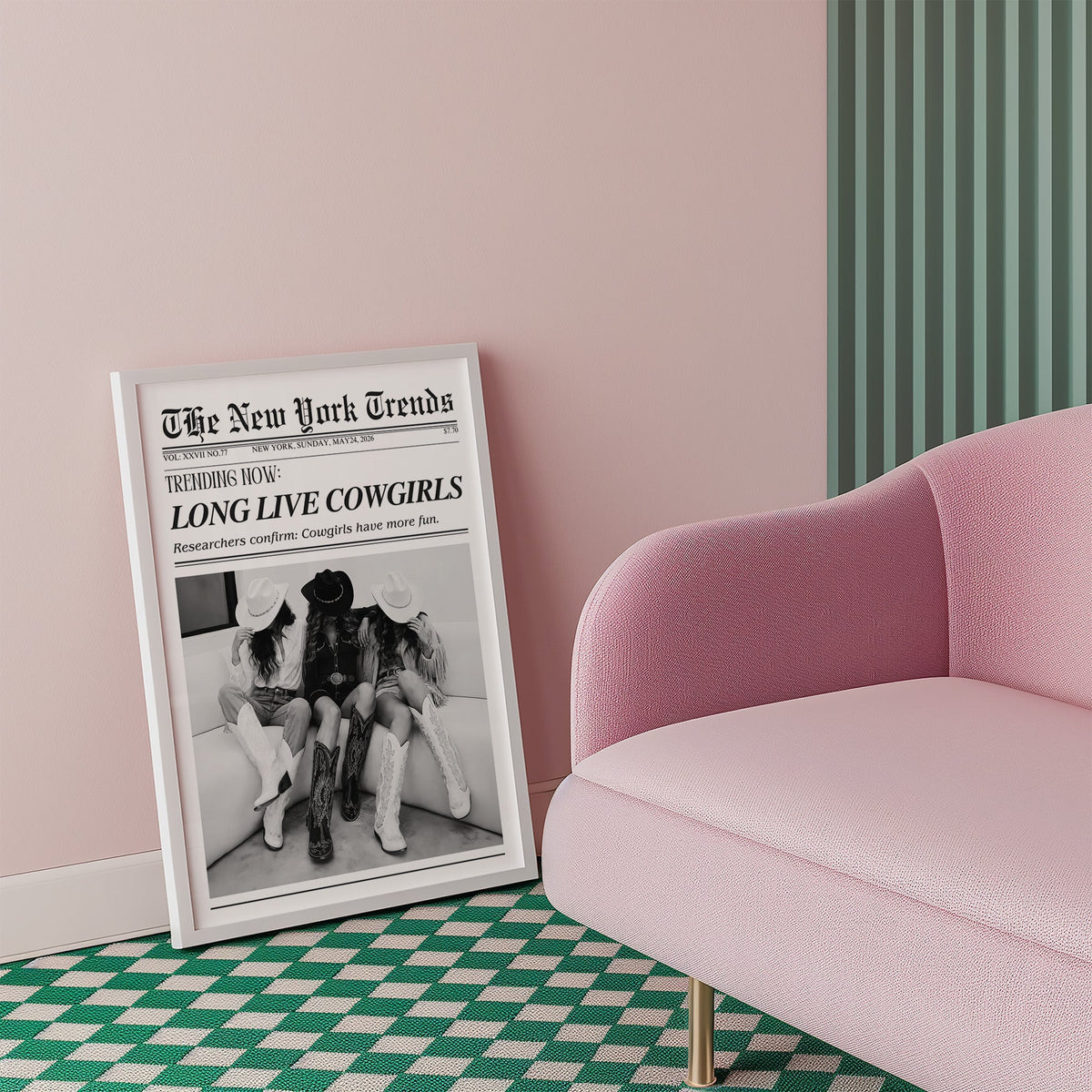 Three cowgirls on white sofa mock newspaper print in a white frame beside a pink armchair on a checkered floor