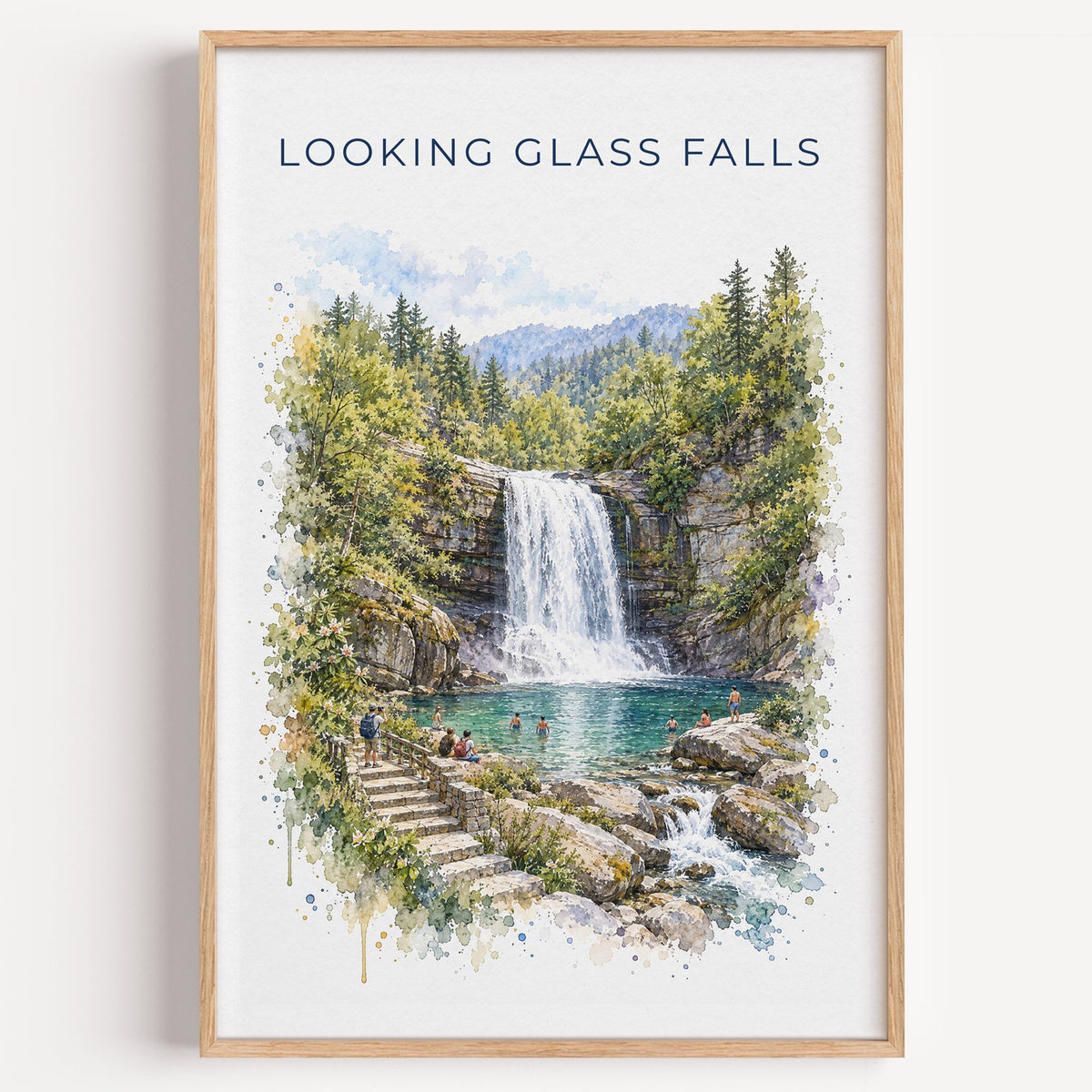 Looking Glass Falls watercolor print in a light oak frame on a plain white wall