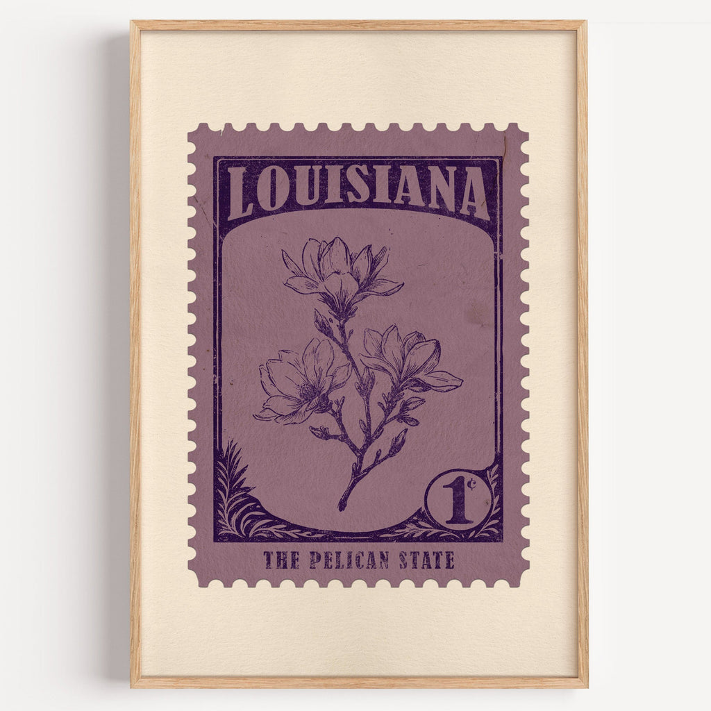 Louisiana state flower stamp print in aubergine on dusty mauve, light oak frame on a plain white wall
