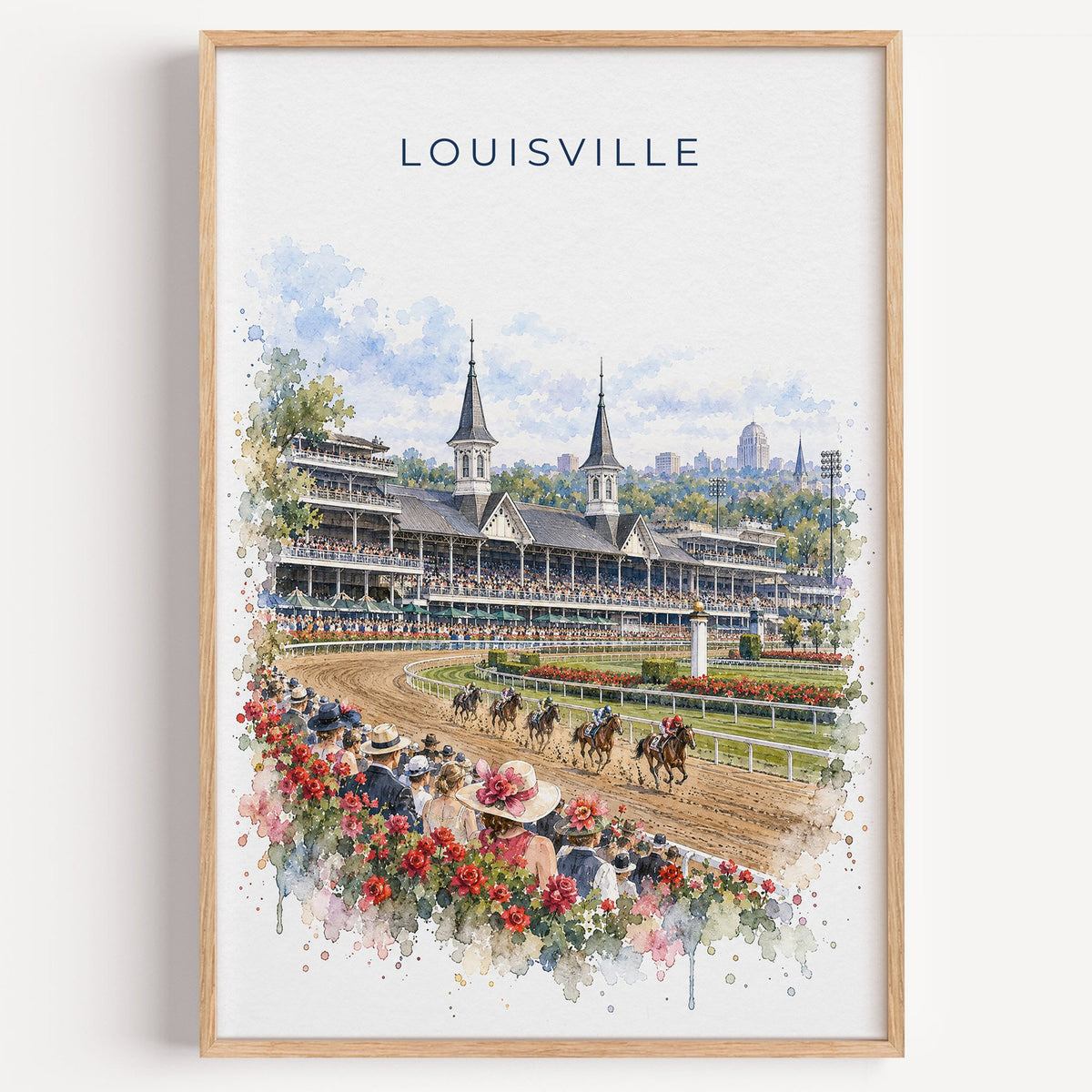Louisville watercolor print in a light oak frame on a plain white wall