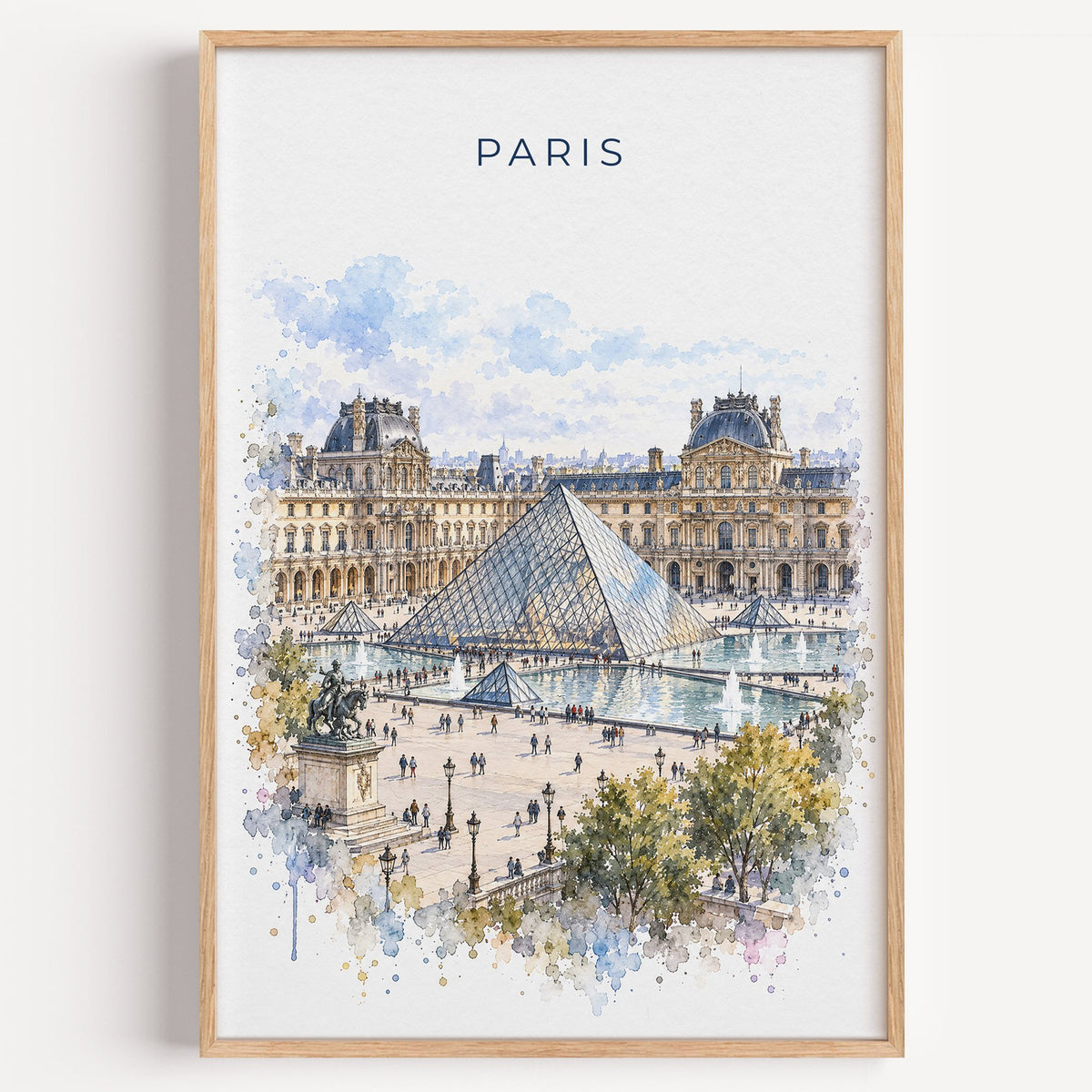 Louvre watercolor print in a light oak frame on a plain white wall