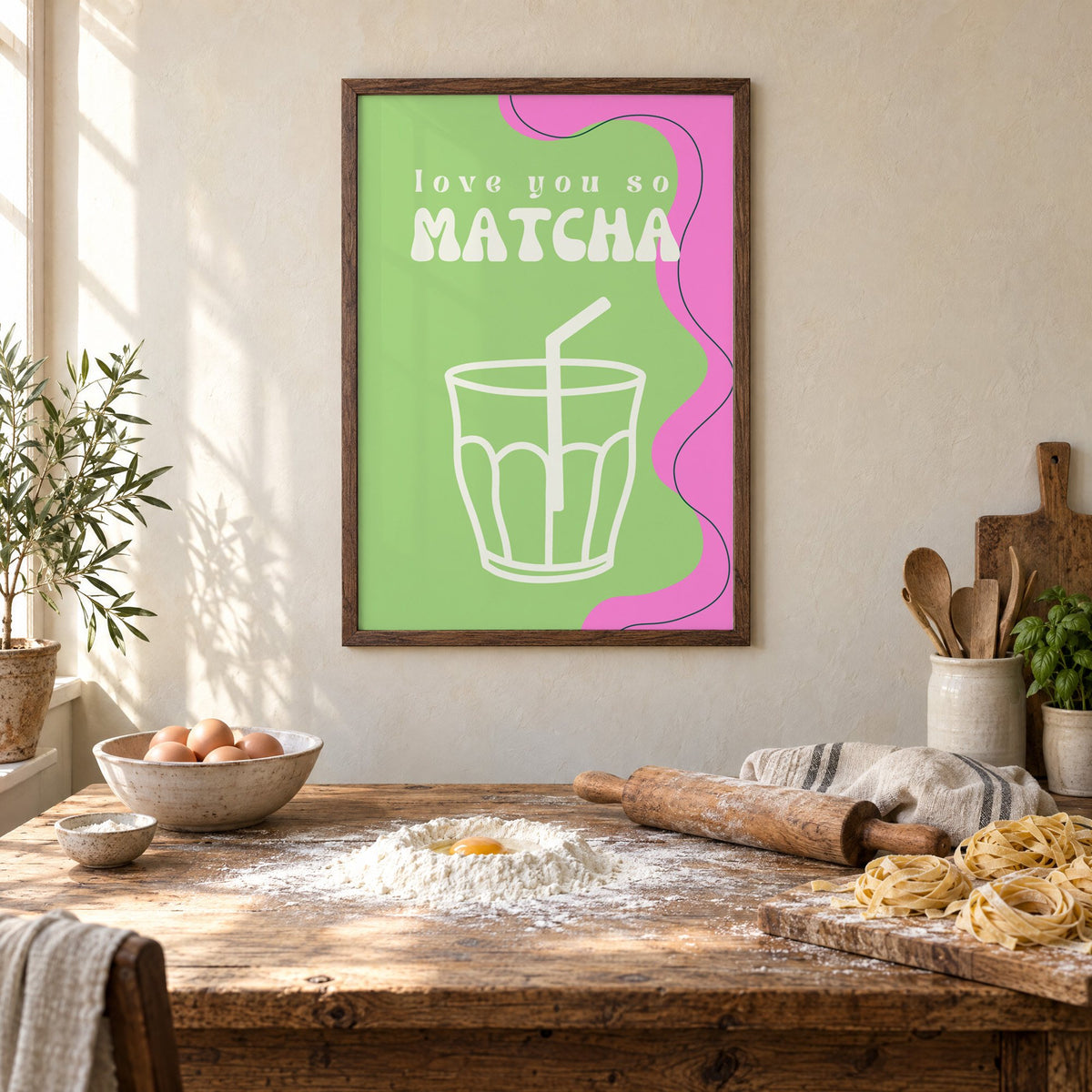 Love you so MATCHA outline glass print in a walnut frame above a rustic table set for making fresh pasta