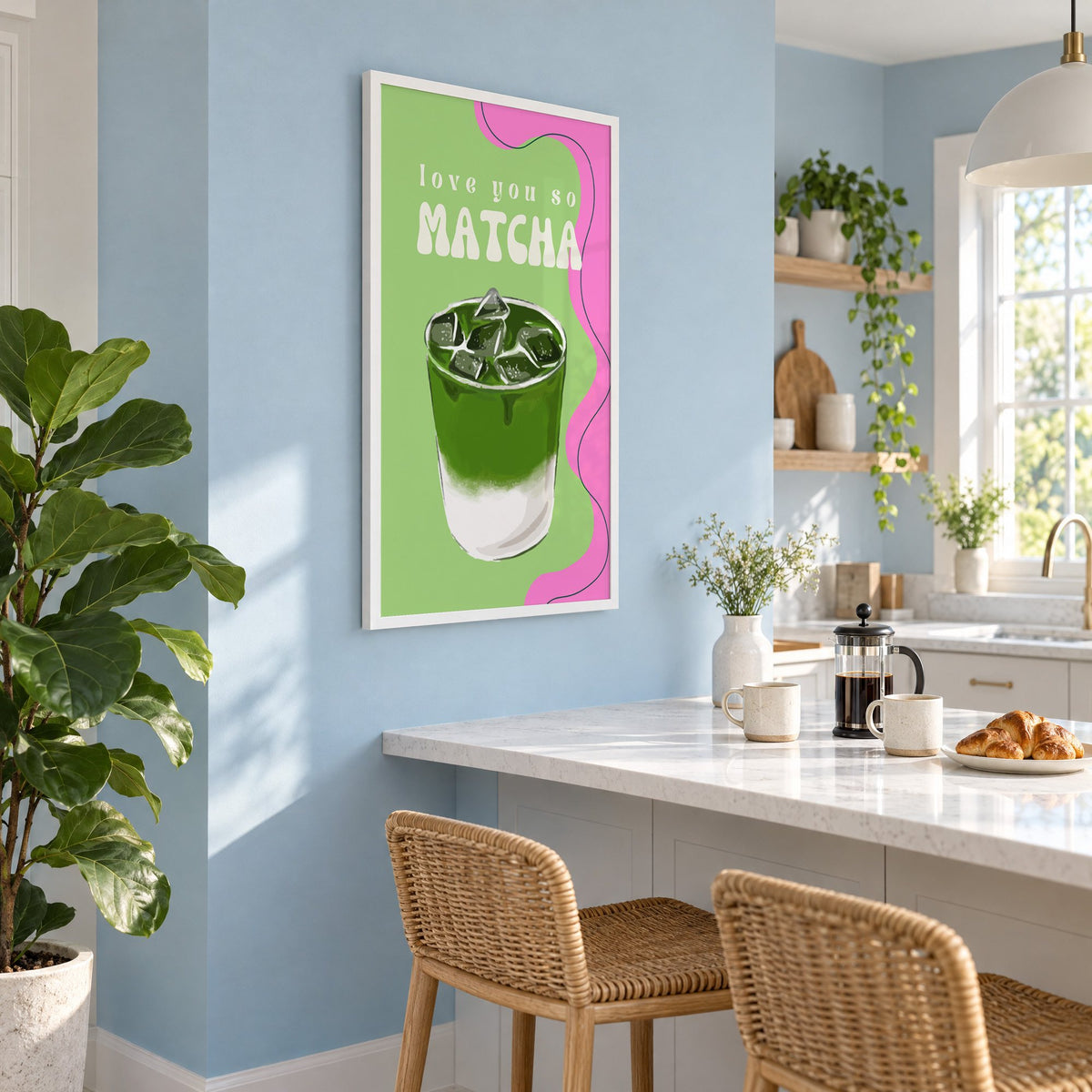 Love you so MATCHA iced latte print in a white frame on a pale blue wall above a breakfast bar with rattan stools