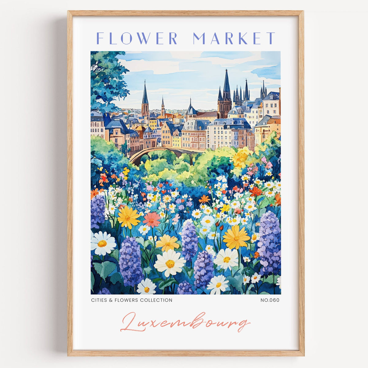 Luxembourg flower market print in a light oak frame on a plain white wall