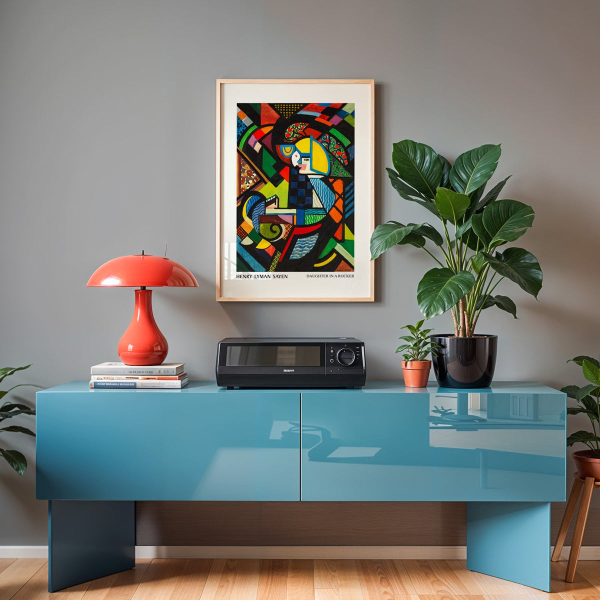 Sayen print in an oak frame above a teal sideboard with a red lamp