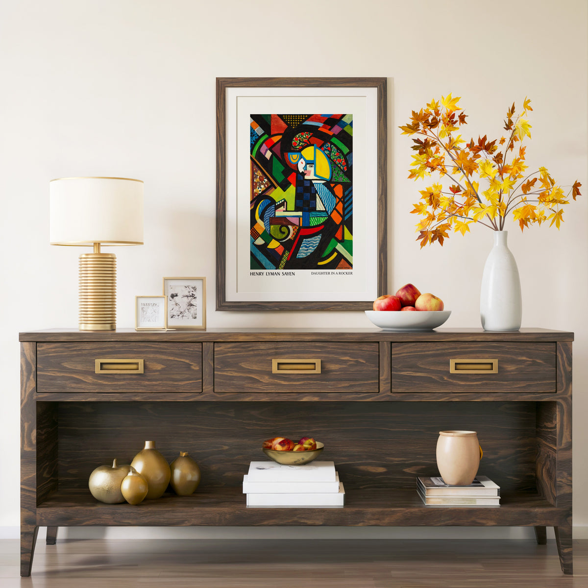 Daughter in a Rocker print in a walnut frame above a console with branches