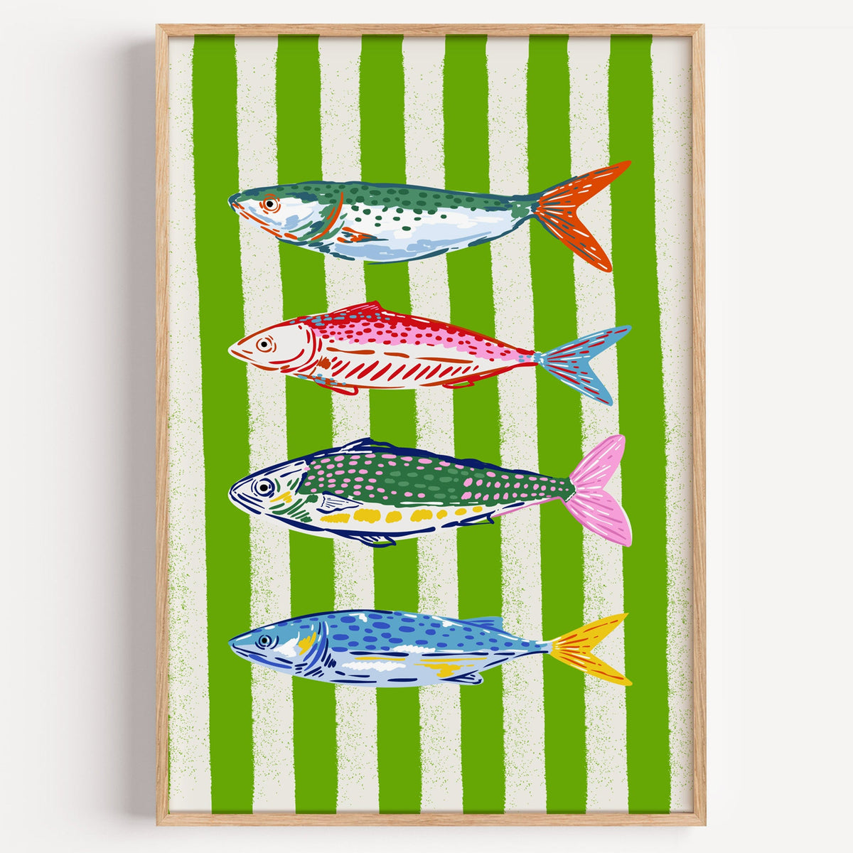 Mackerel row green stripe print in a light oak frame on a plain white wall