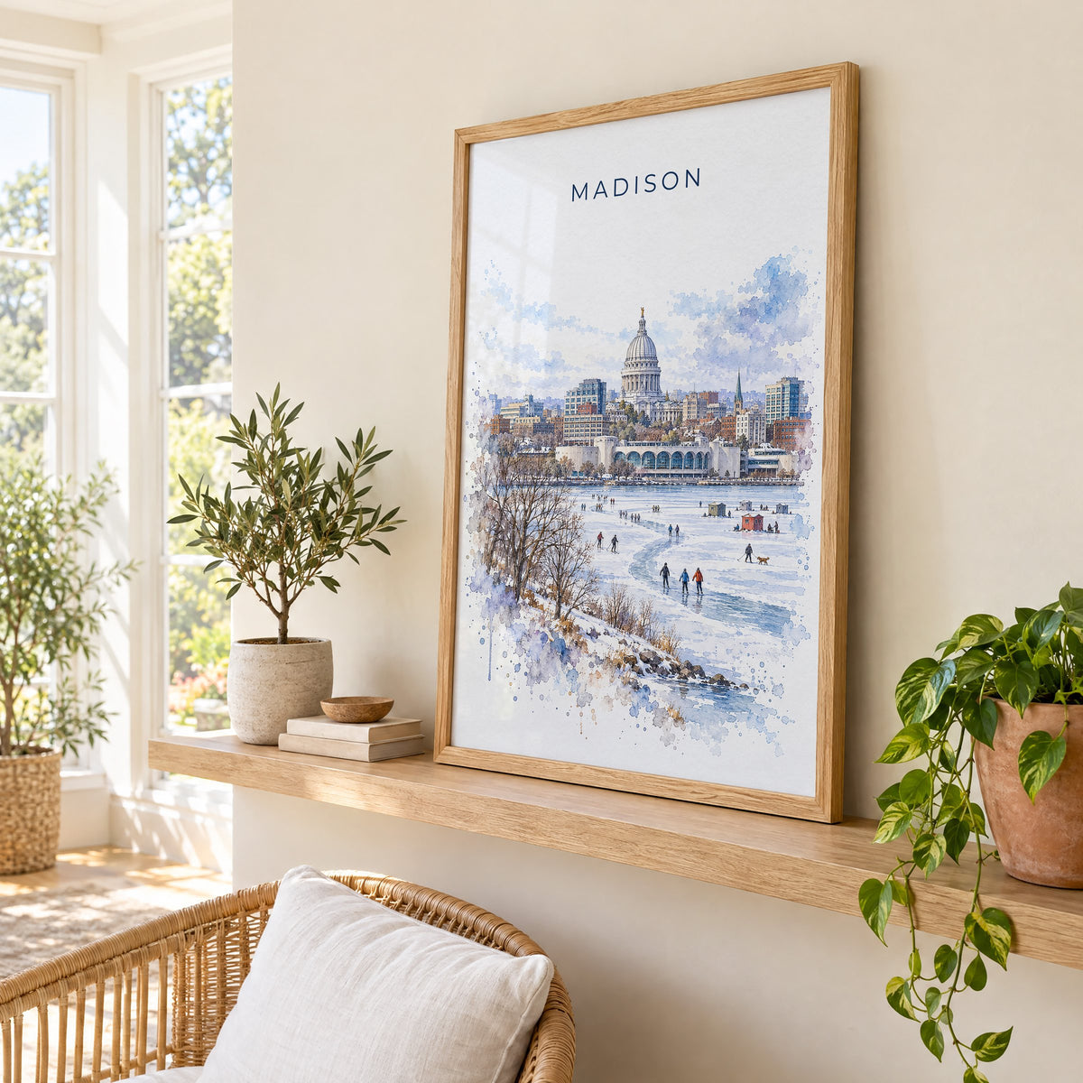 Madison watercolor print in an oak frame on a picture ledge in a sunlit sunroom