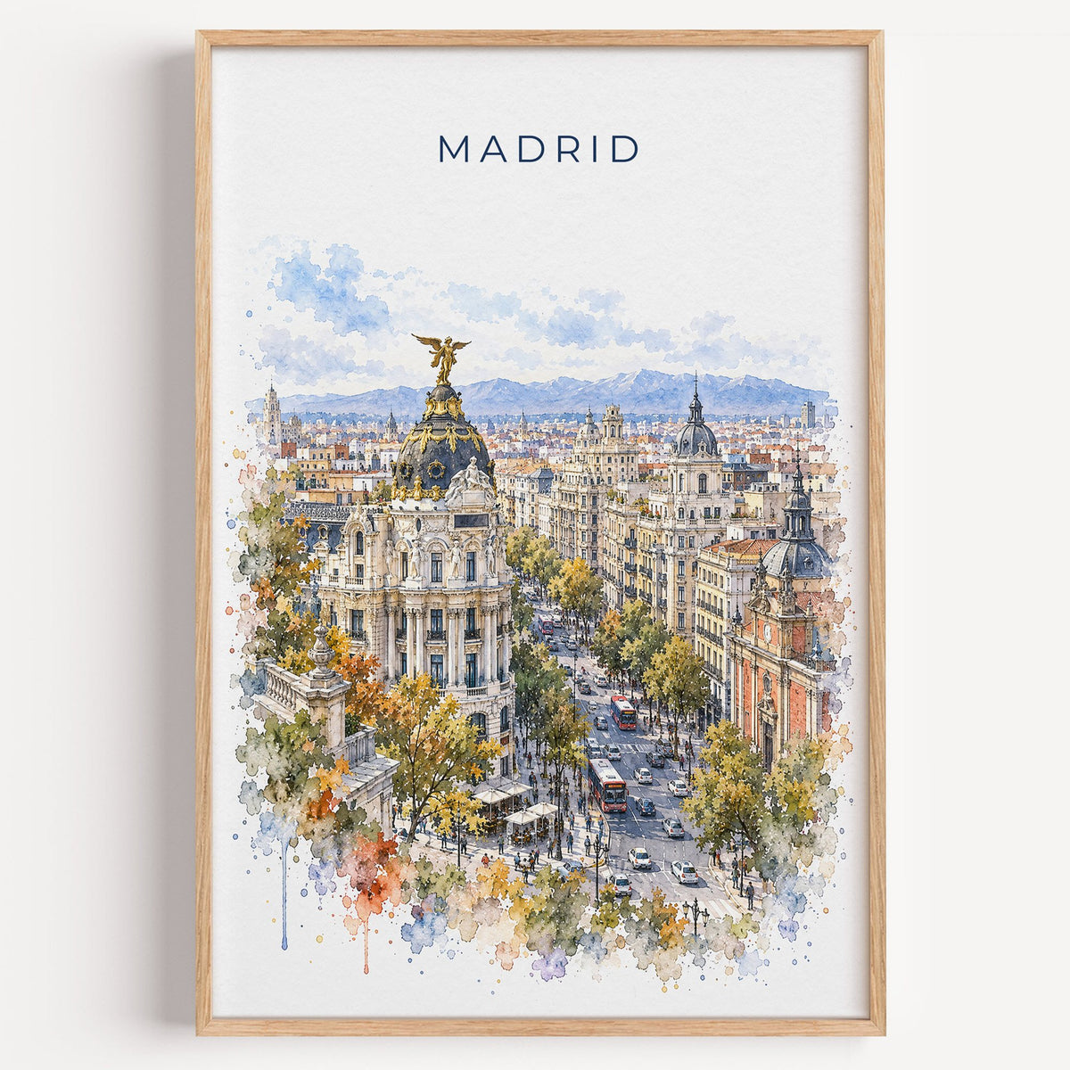 Madrid watercolor print in a light oak frame on a plain white wall