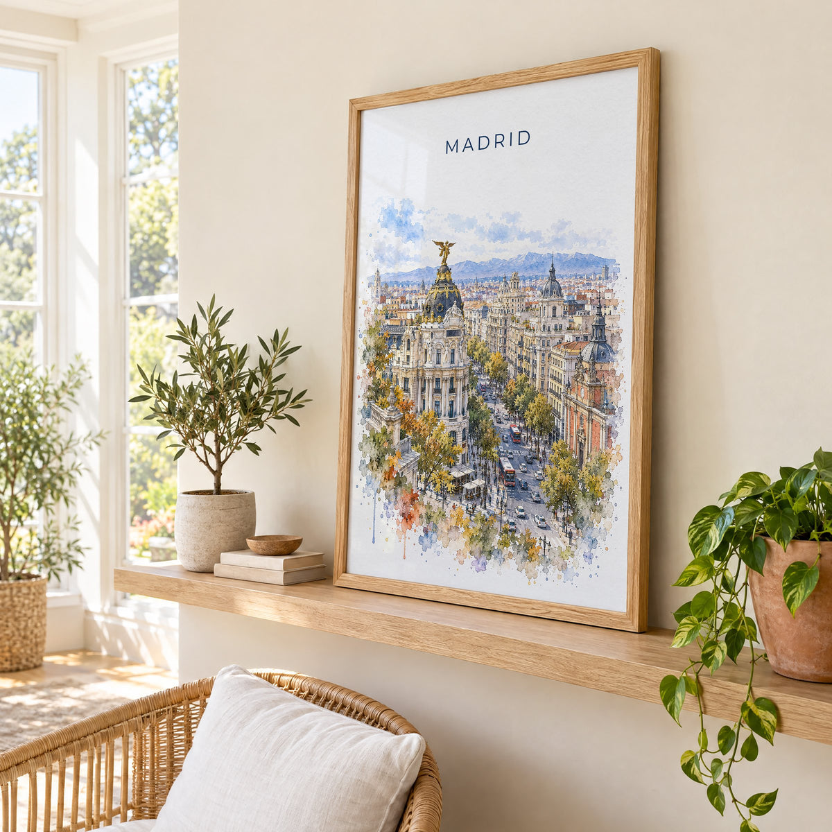 Madrid watercolor print in an oak frame on a picture ledge in a sunlit sunroom