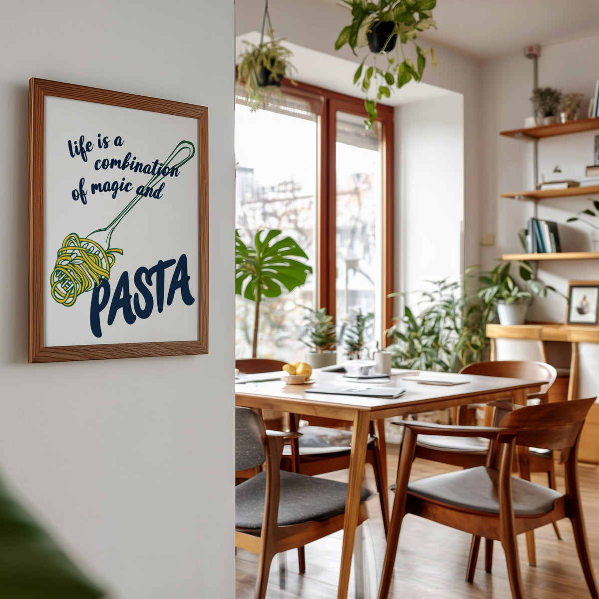 Magic and Pasta print in a walnut frame beside a mid-century dining table