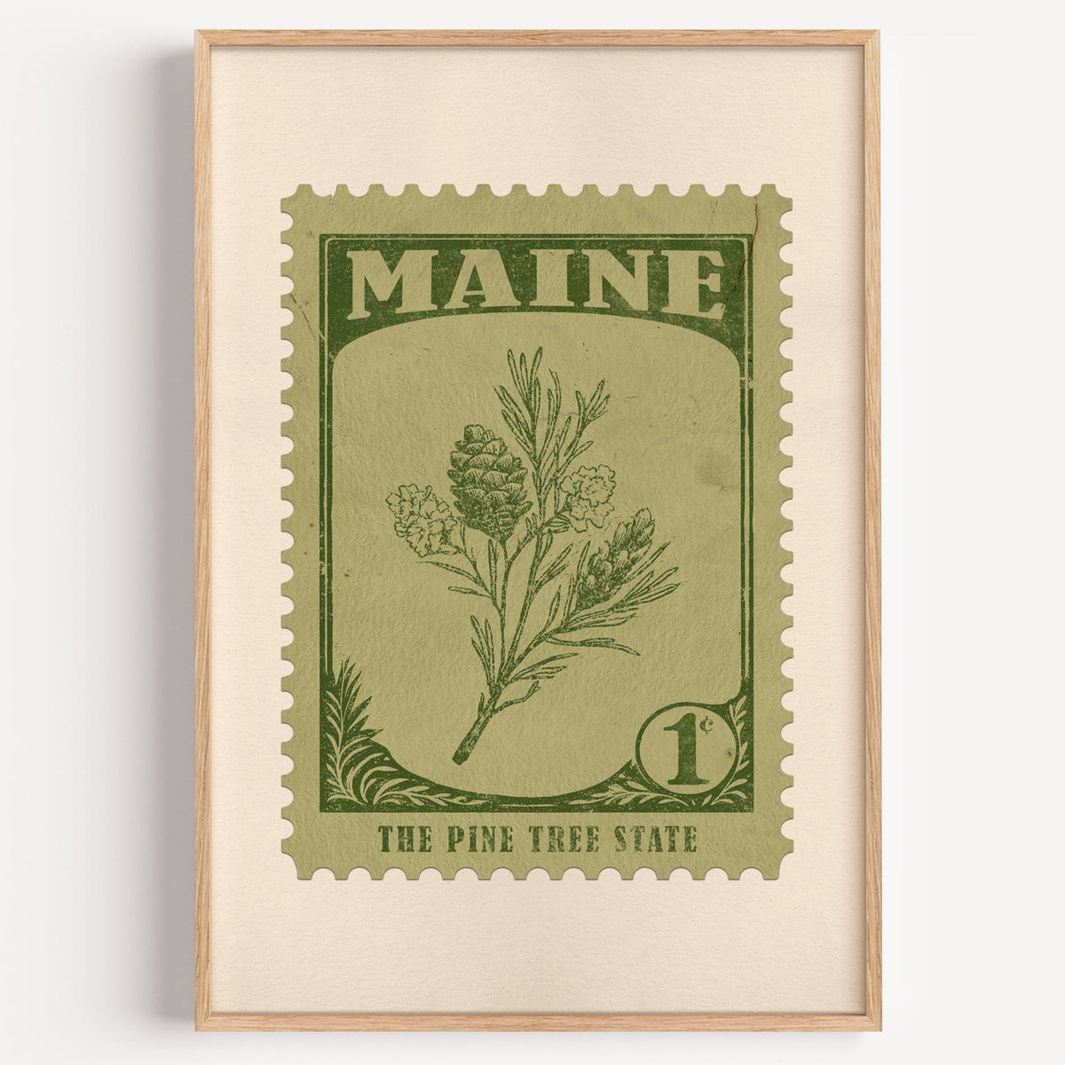 Maine state flower stamp print in olive green on sage, light oak frame on a plain white wall
