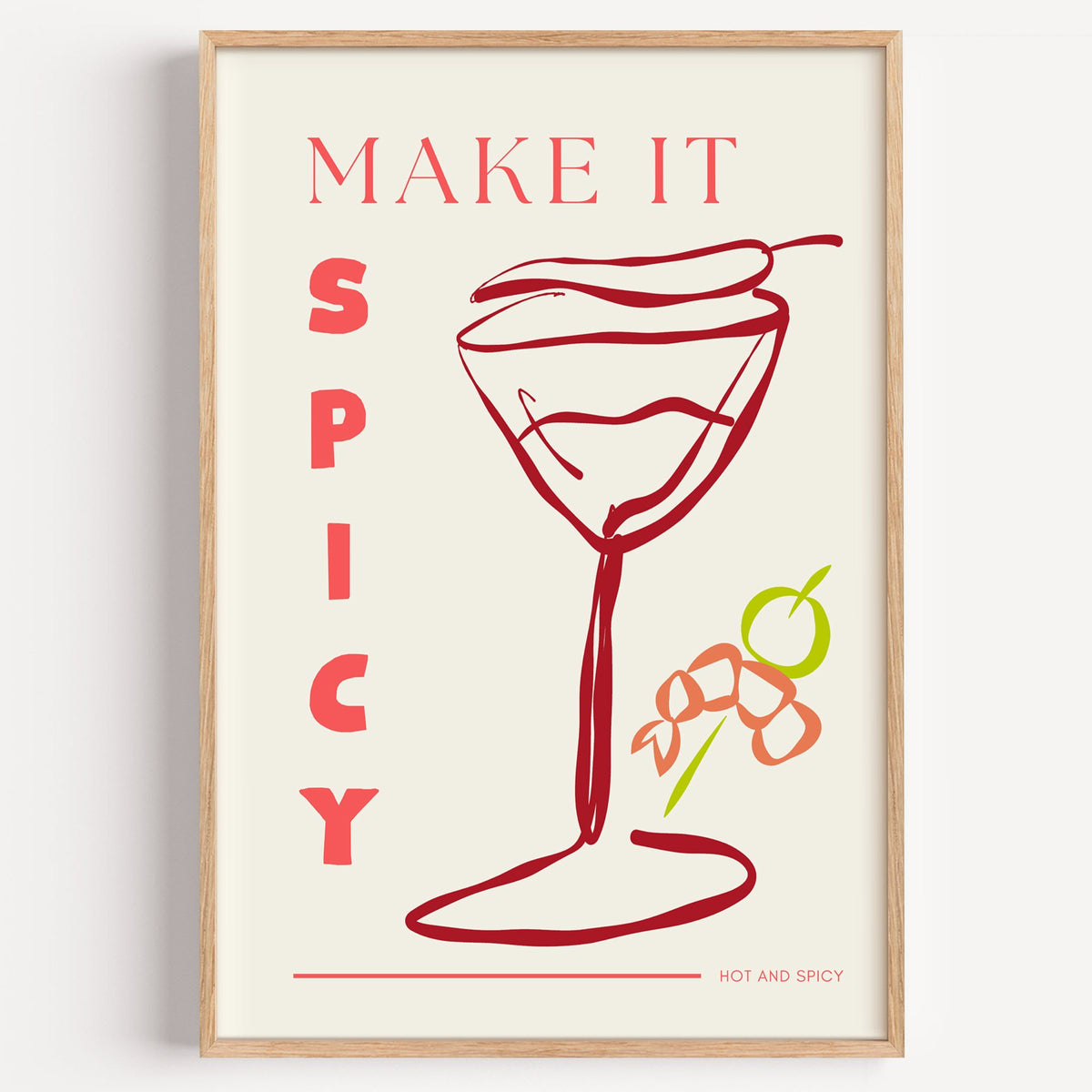 Make It Spicy martini line art print in a light oak frame on a plain white wall