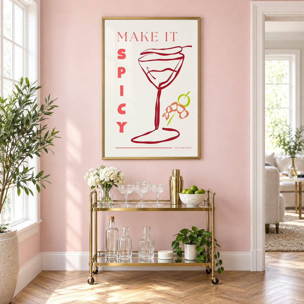 Make It Spicy martini line art print in a brass frame above a gold bar cart on a blush pink wall
