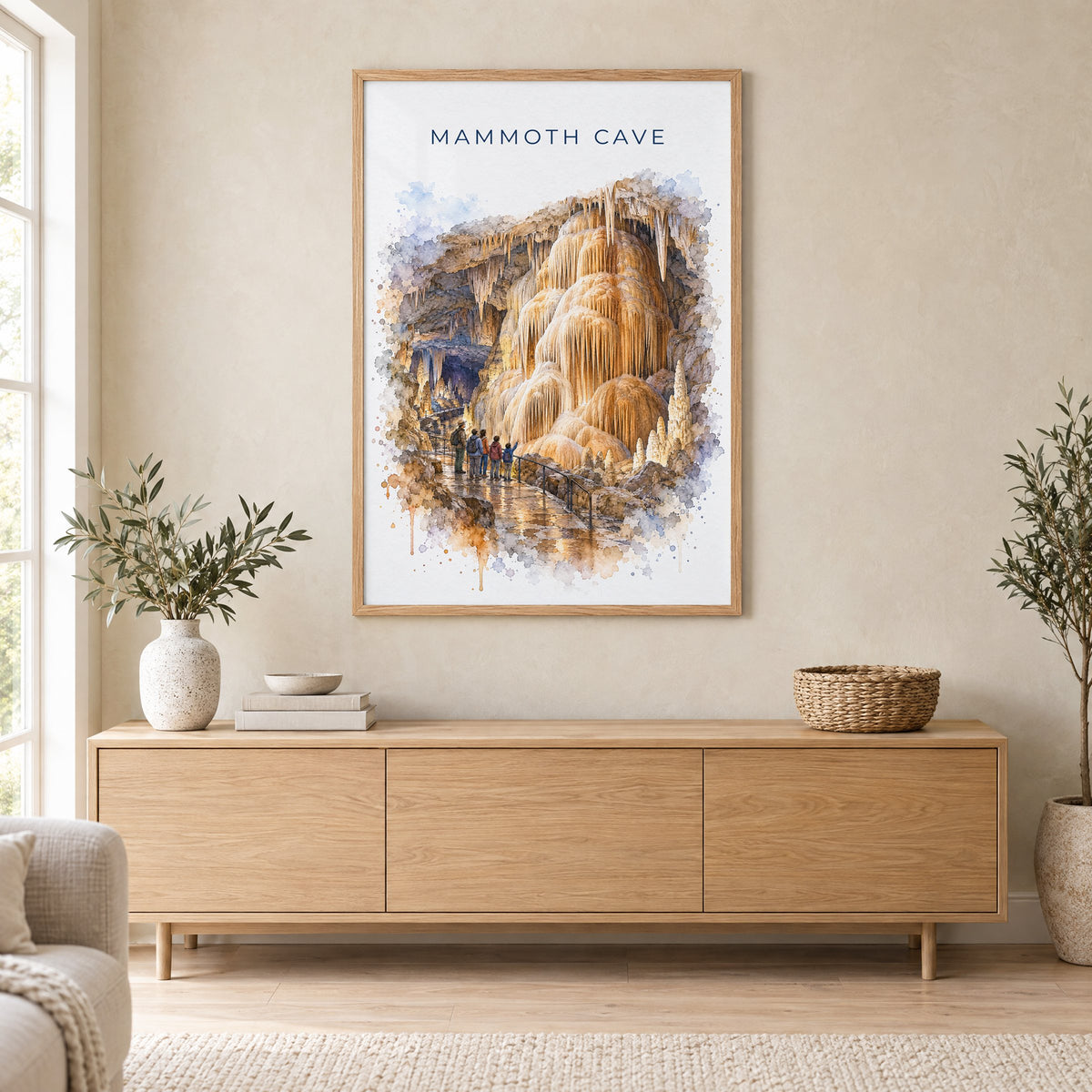 Mammoth Cave National Park watercolor print in an oak frame above a light wood sideboard in a Scandinavian living room