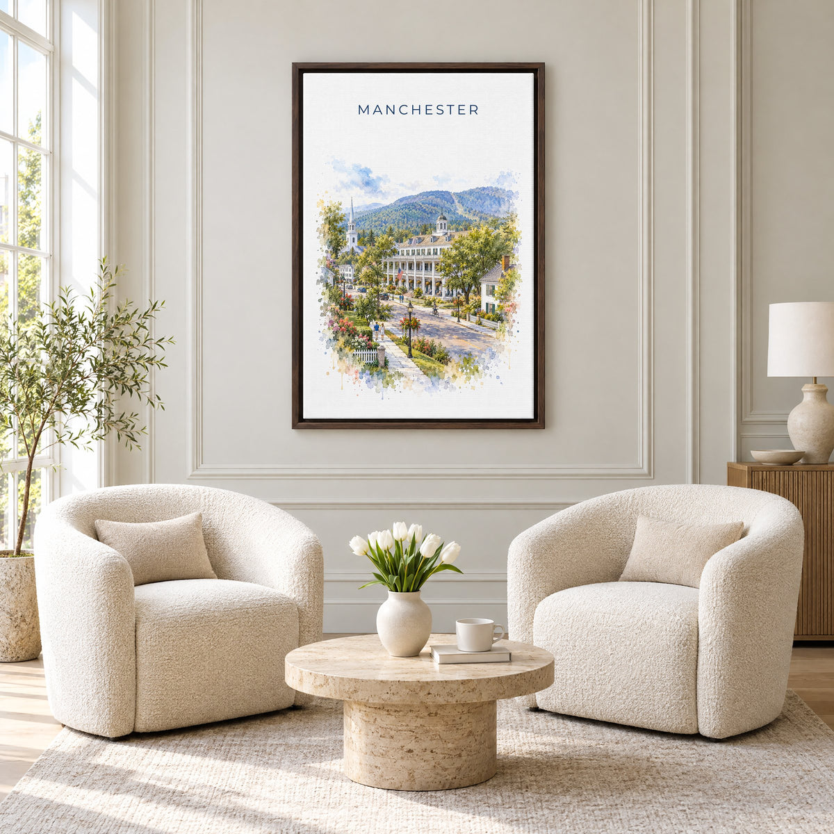 Manchester, Vermont watercolor print as an espresso floater canvas above two boucle armchairs in a hotel lounge