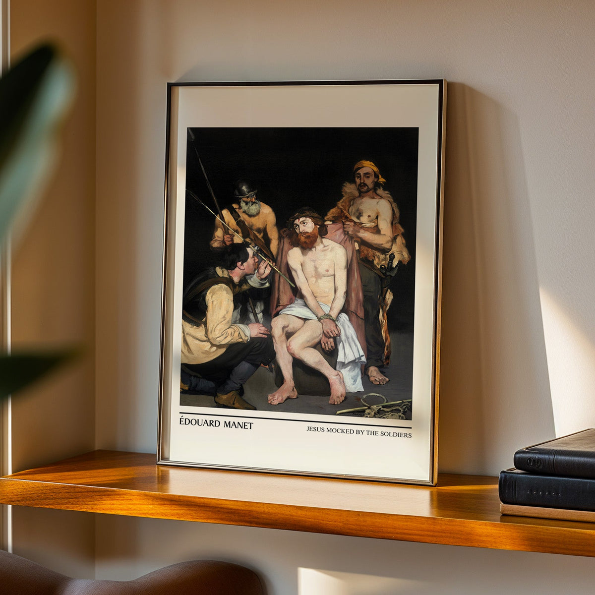 Manet 1865 print in a black frame on a walnut shelf in evening light