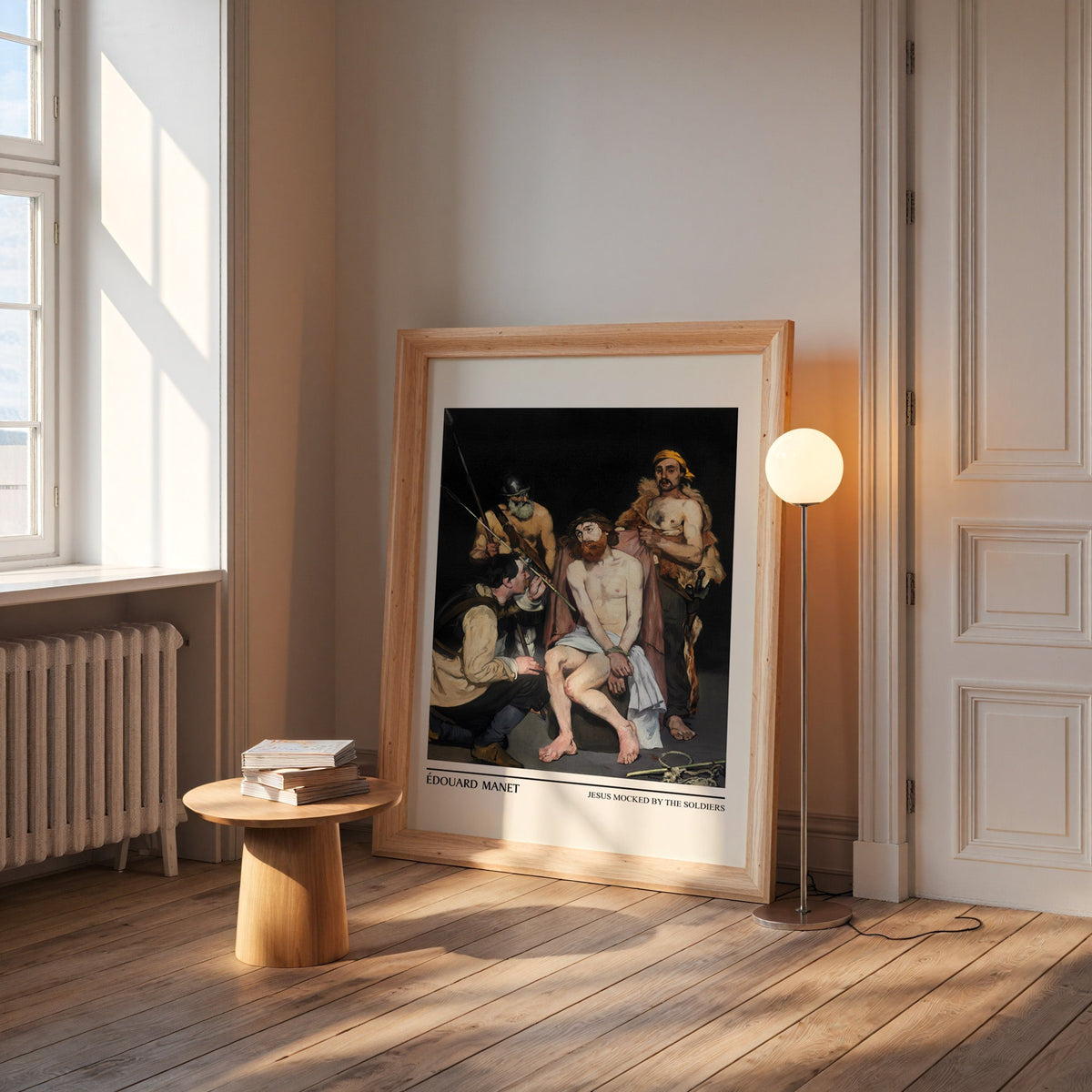 Manet figure print in a wide pine frame leaning by a sunlit window