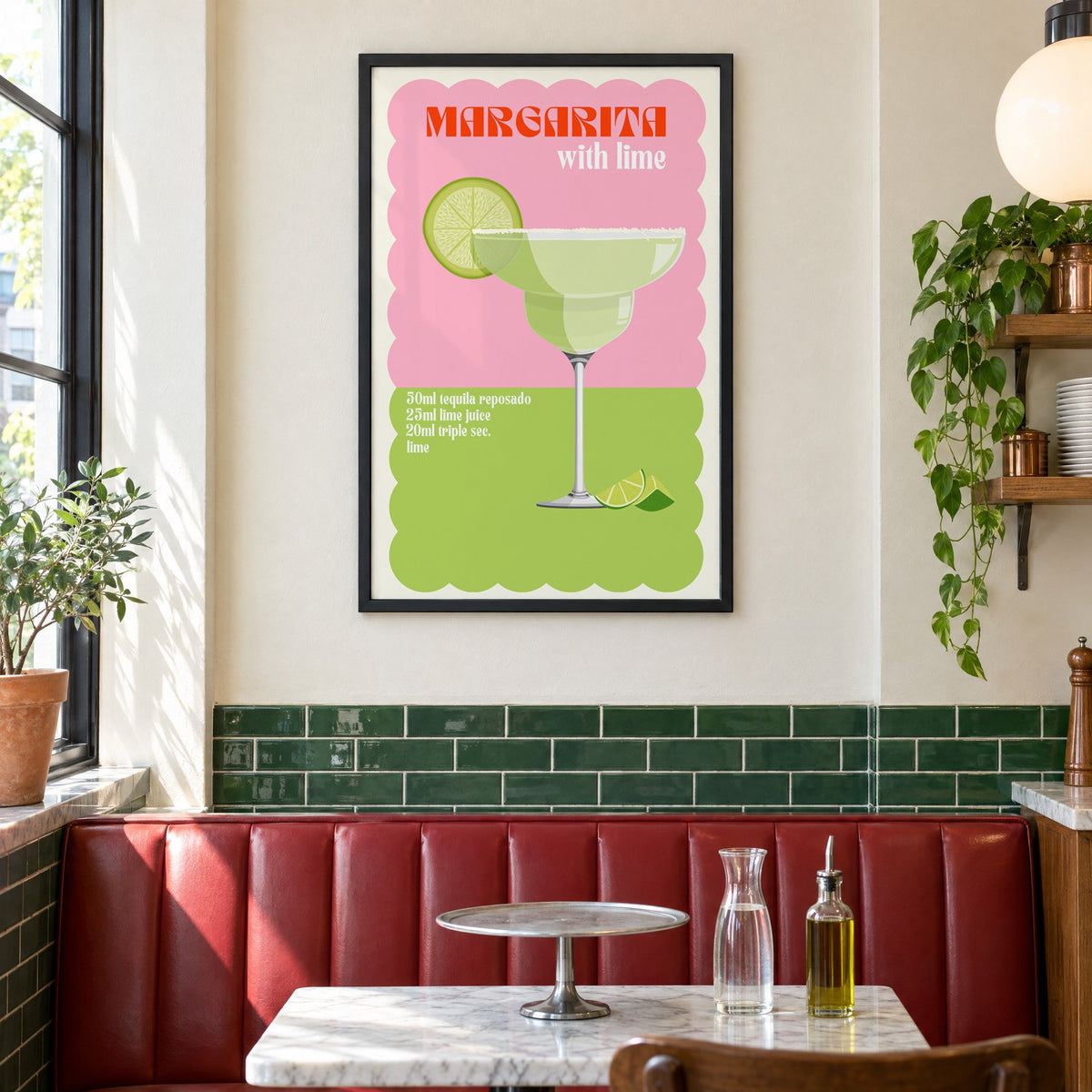 Margarita with lime scalloped print in a black frame above a red leather booth in a sunny pizzeria