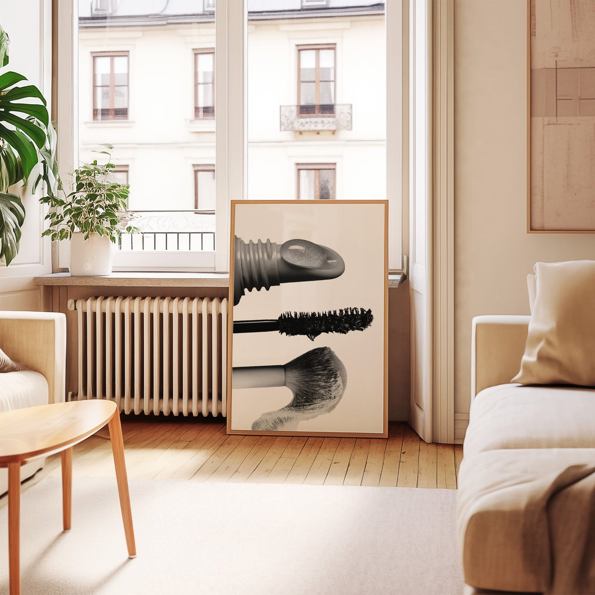 Macro gloss wand, mascara and blush brush print in an oak frame leaning by a French window in a living room