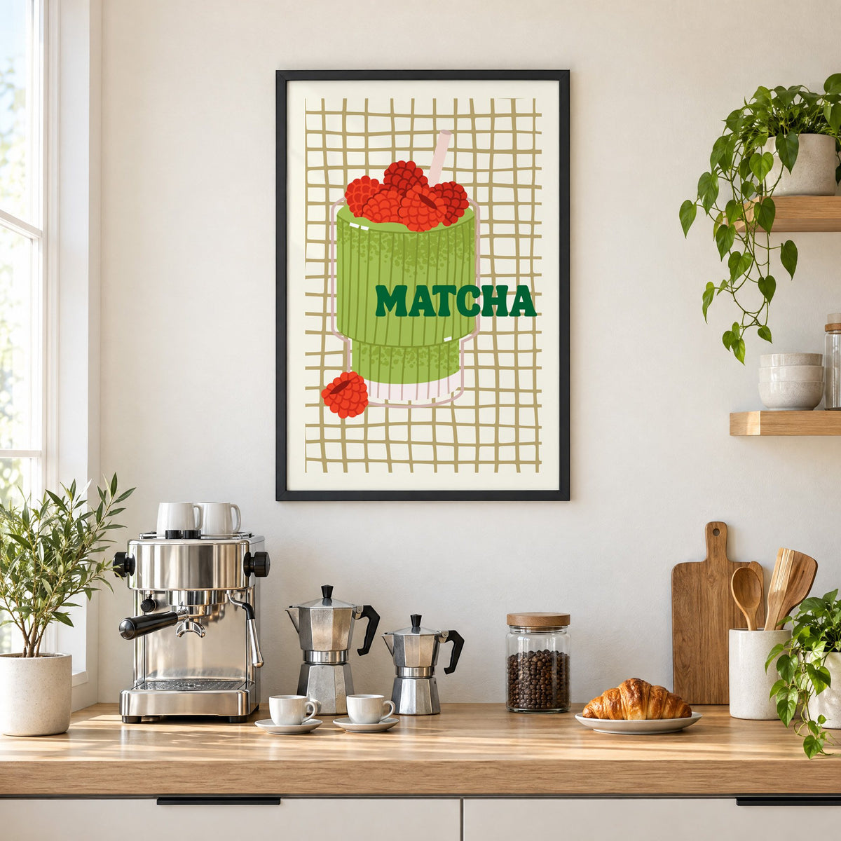 MATCHA raspberry glass on grid print in a black frame above a home espresso bar with moka pots and espresso cups