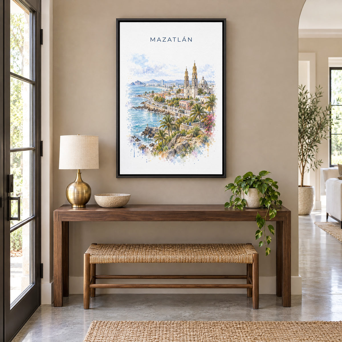 Mazatlan watercolor print as a black floater canvas above a walnut console and woven bench in an entryway