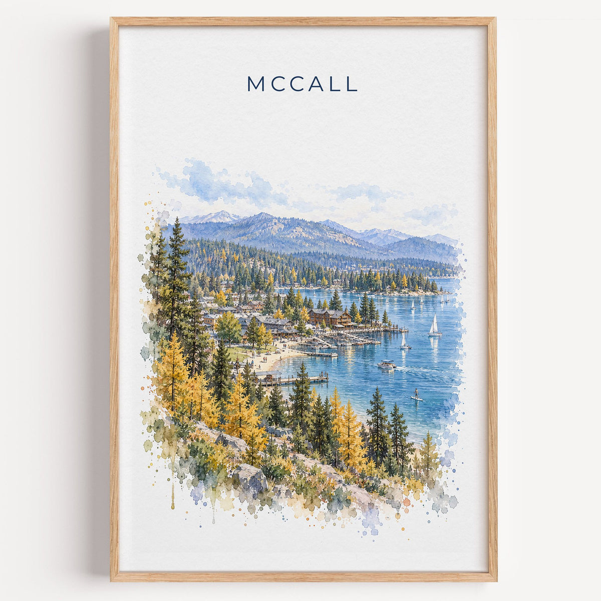 McCall, Idaho watercolor print in a light oak frame on a plain white wall