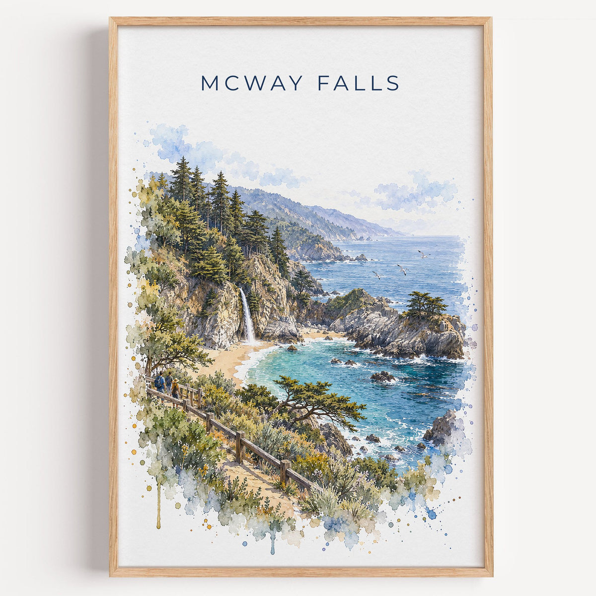 McWay Falls watercolor print in a light oak frame on a plain white wall