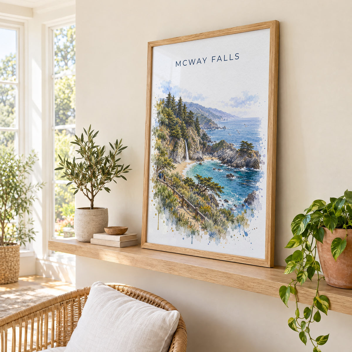 McWay Falls watercolor print in an oak frame on a picture ledge in a sunlit sunroom
