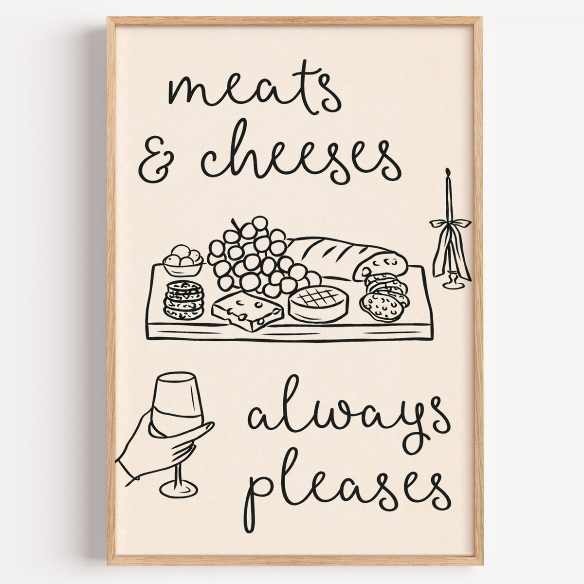 Meats and cheeses charcuterie print in a light oak frame on a plain white wall