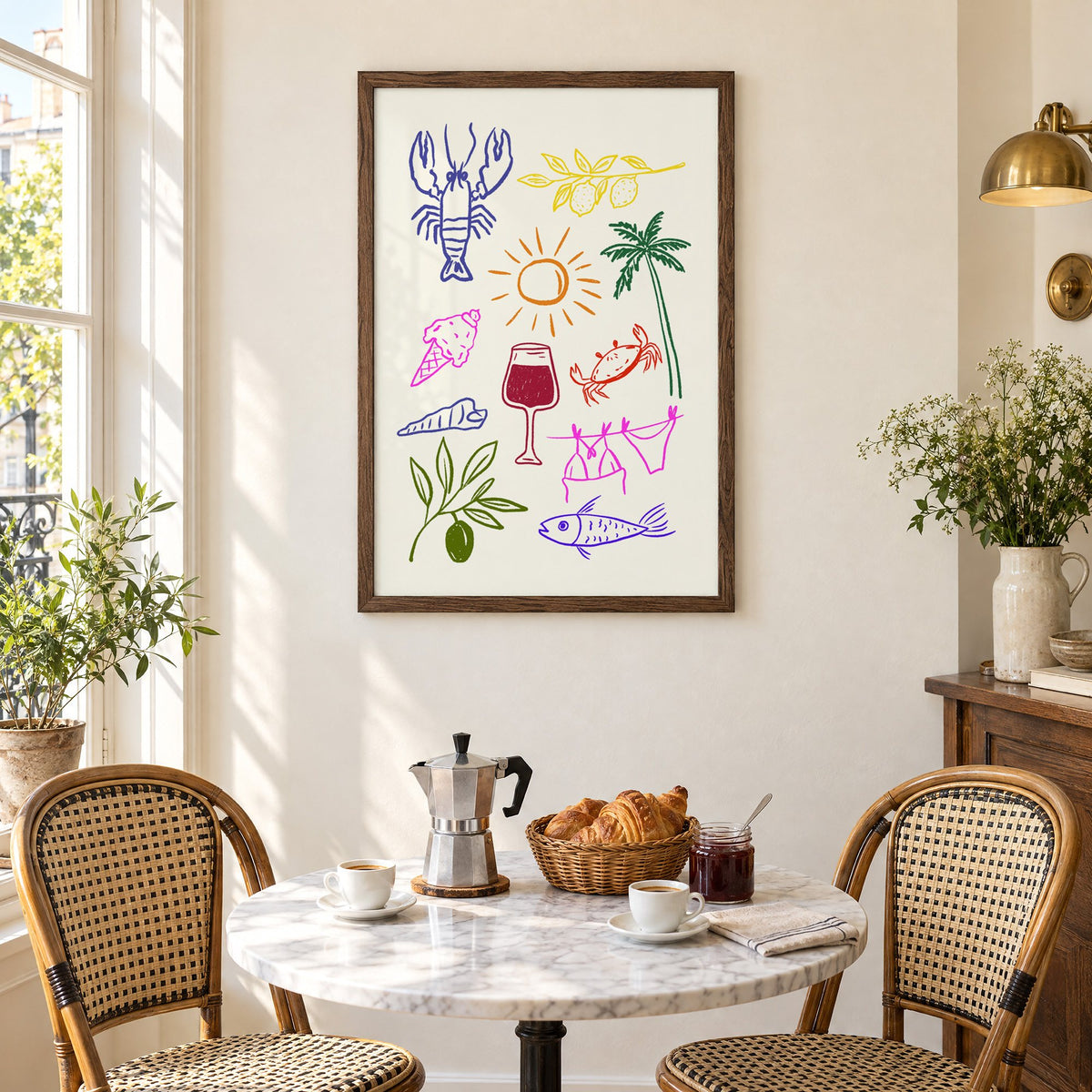 Mediterranean summer doodles lobster and wine print in a walnut frame above a marble bistro table with croissants and rattan chairs