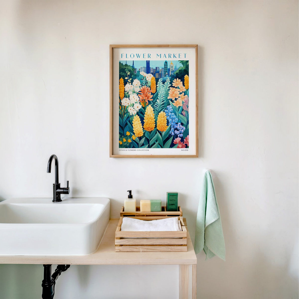 Melbourne flower market print in an oak frame above a white bathroom sink with folded towels