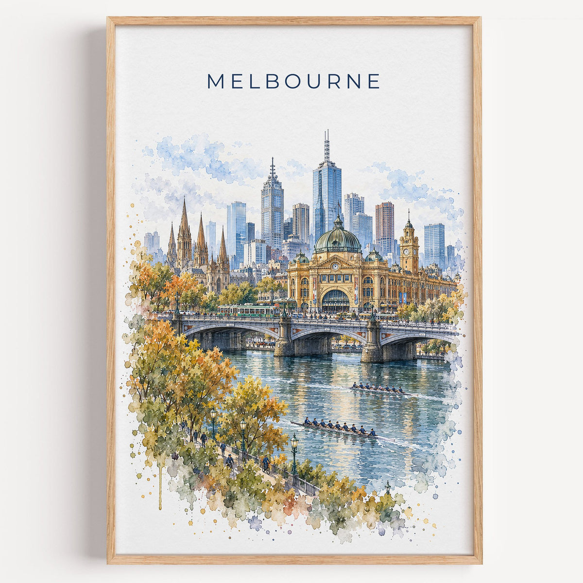 Melbourne watercolor print in a light oak frame on a plain white wall