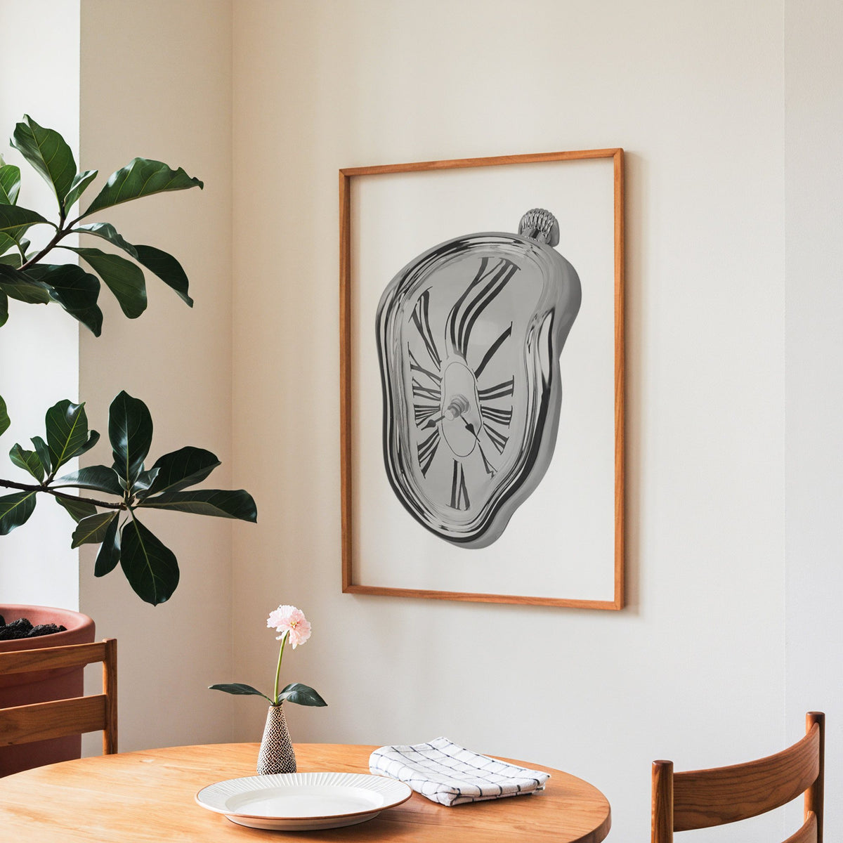 Melting silver clock with Roman numerals print in a teak frame above a round wooden dining table