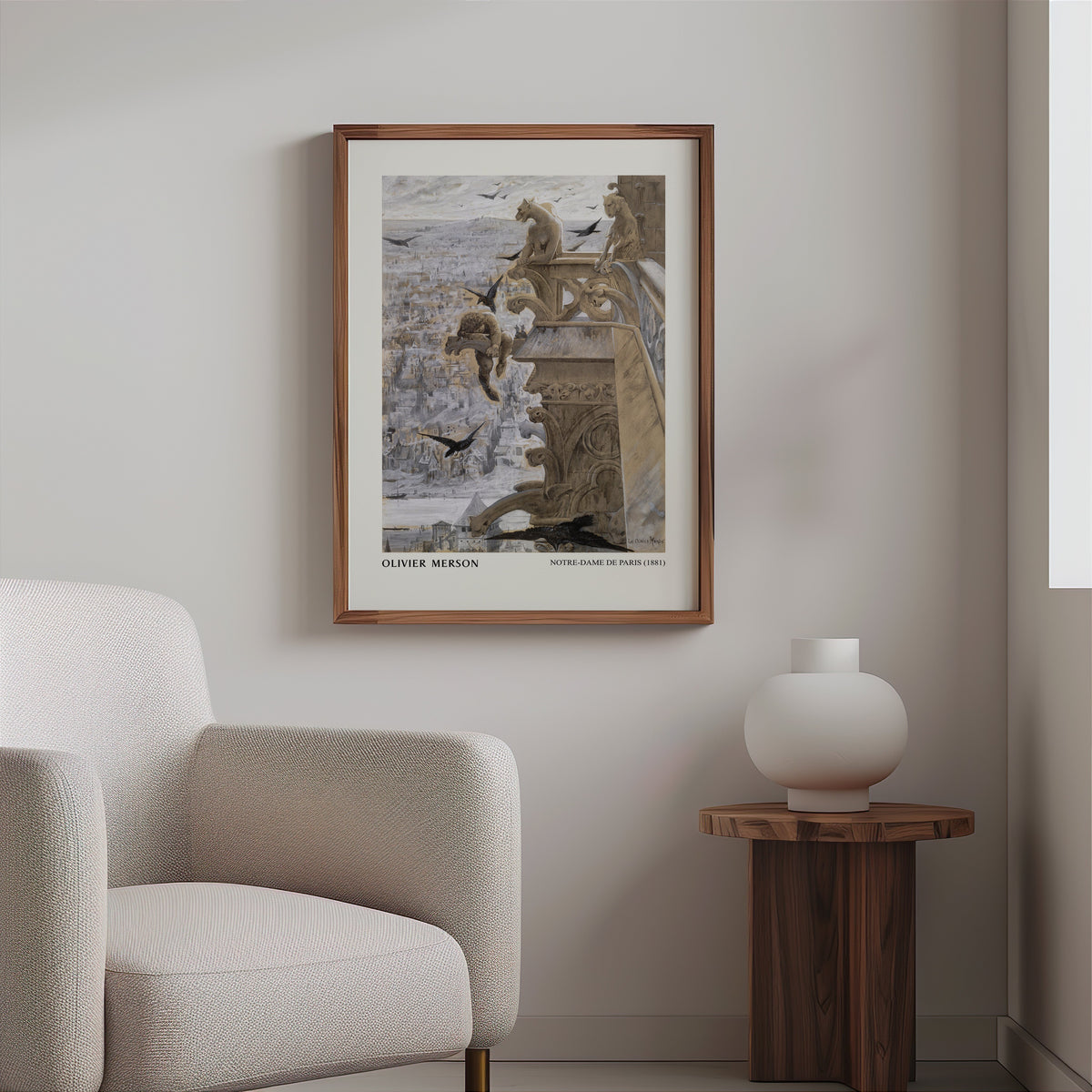 Notre-Dame gargoyle print in a slim walnut frame above a bouclé armchair