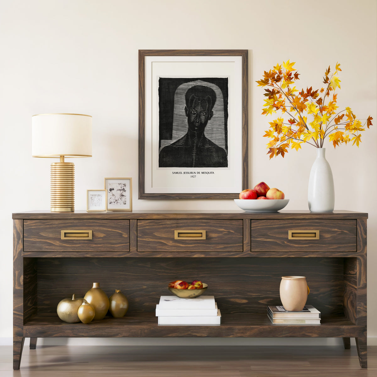 Mesquita portrait print in a walnut frame above a console with autumn branches