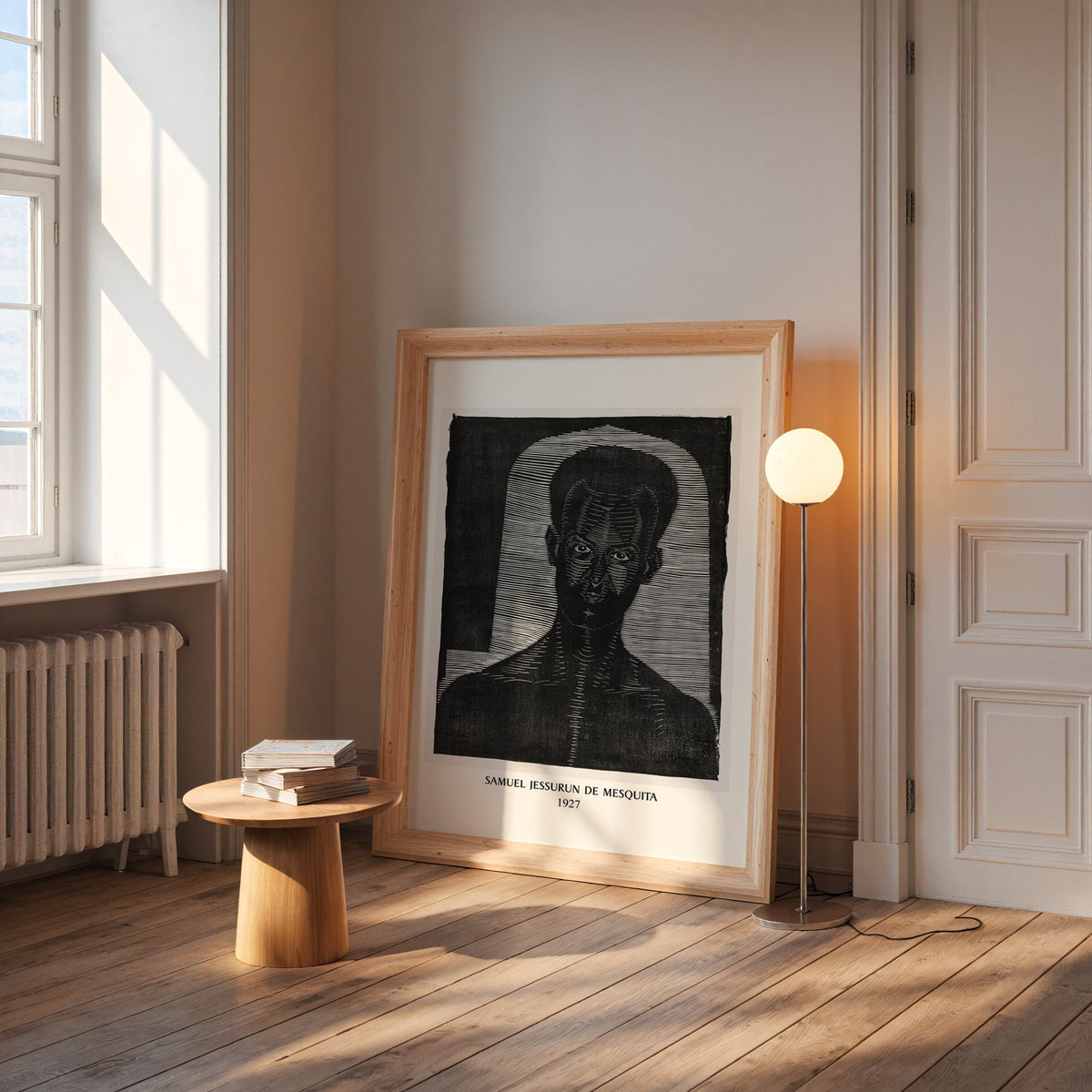 Mesquita print in a wide pine frame leaning by a sunlit window