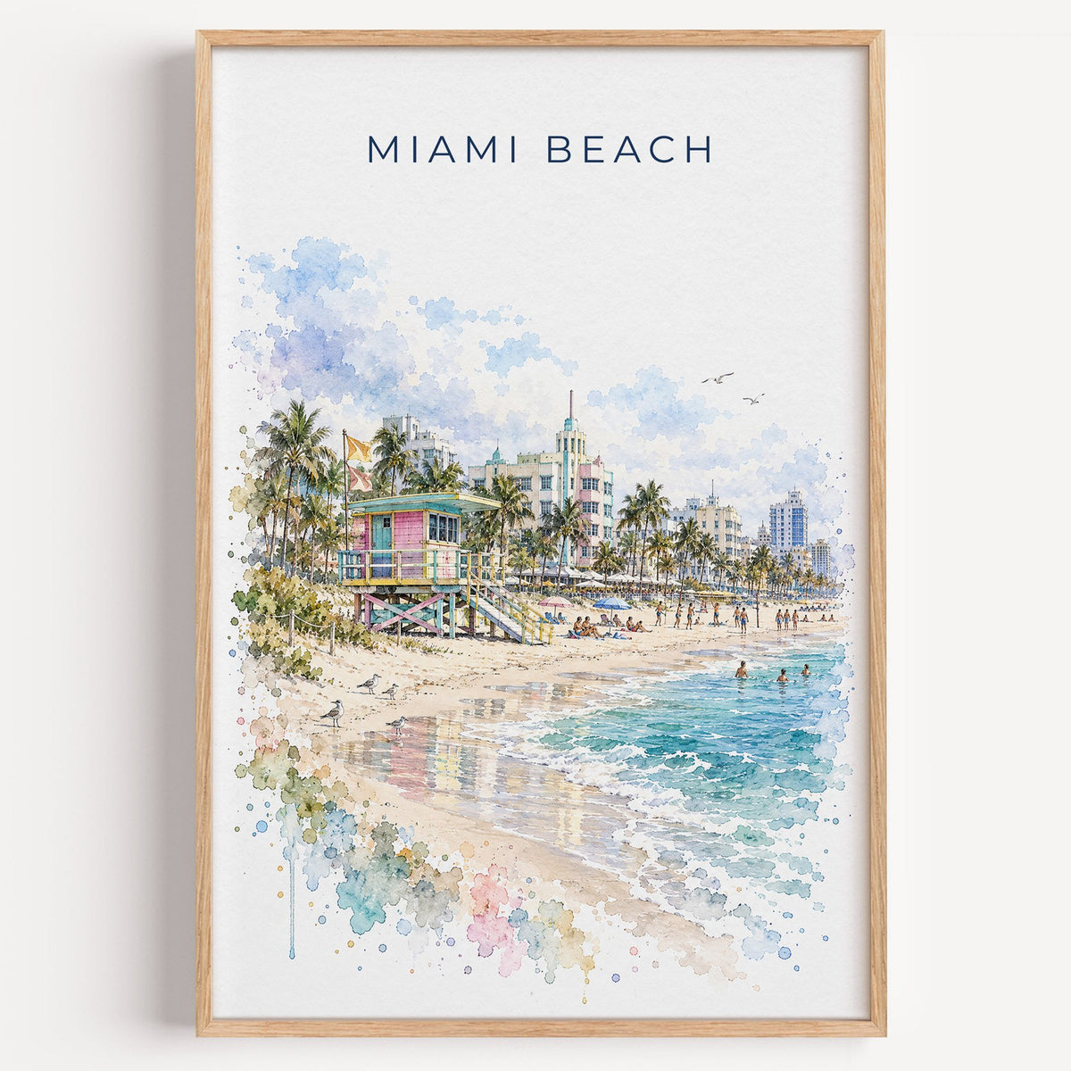 Miami Beach watercolor print in a light oak frame on a plain white wall
