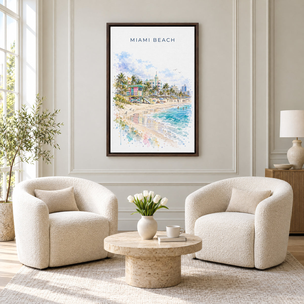 Miami Beach watercolor print as an espresso floater canvas above two boucle armchairs in a hotel lounge