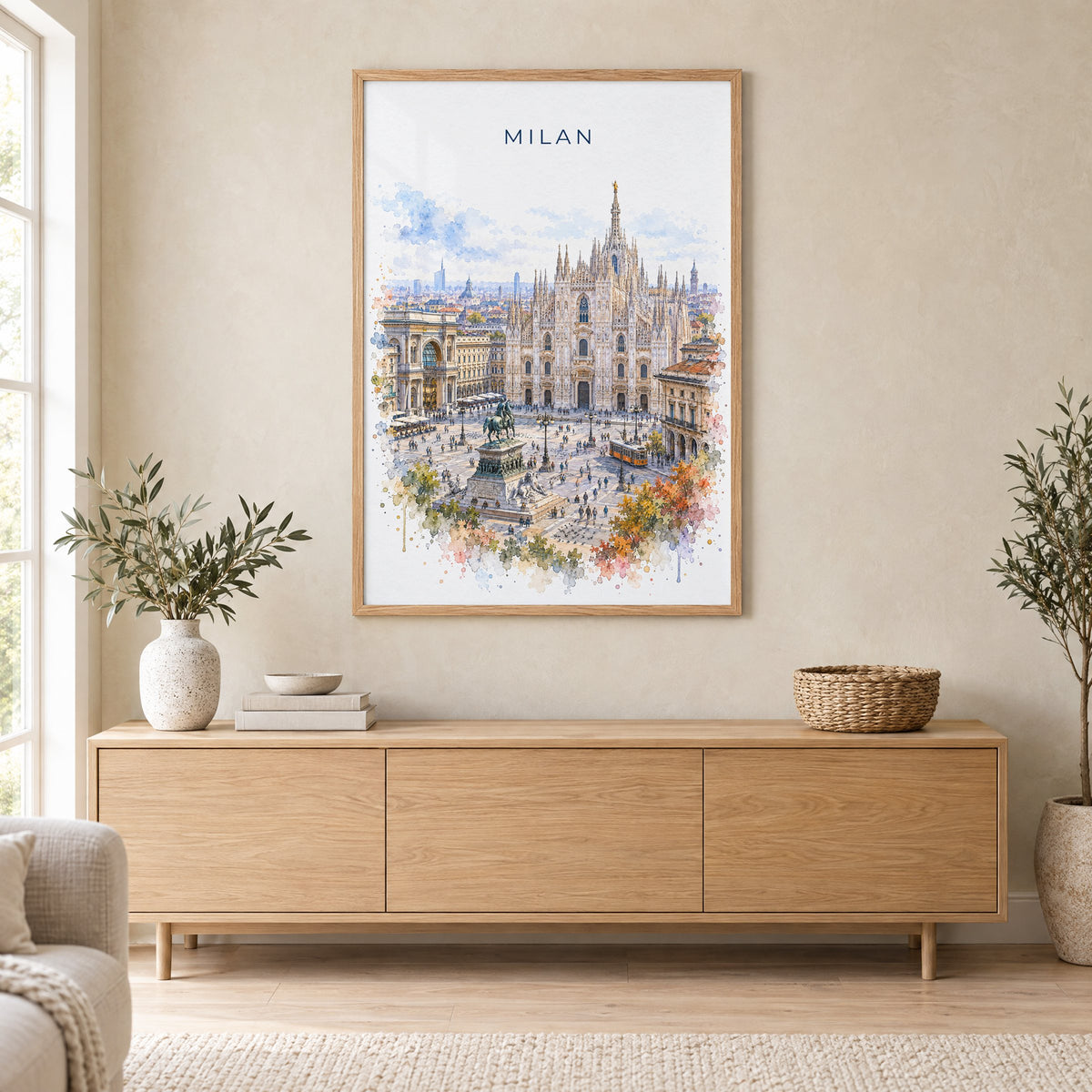 Milan watercolor print in an oak frame above a light wood sideboard in a Scandinavian living room