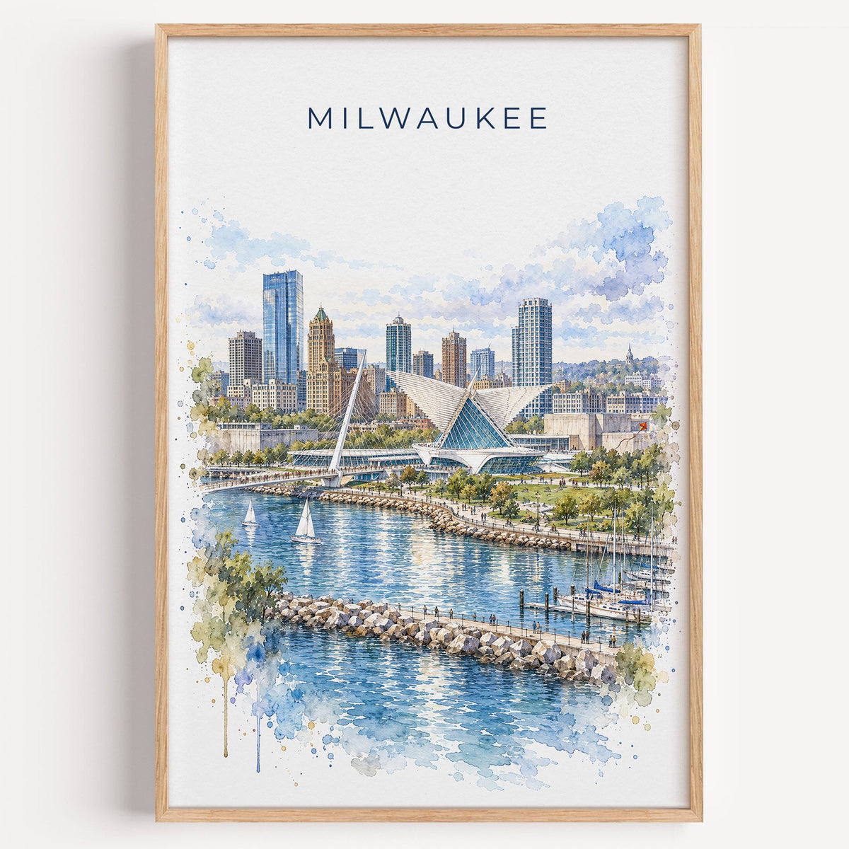 Milwaukee watercolor print in a light oak frame on a plain white wall