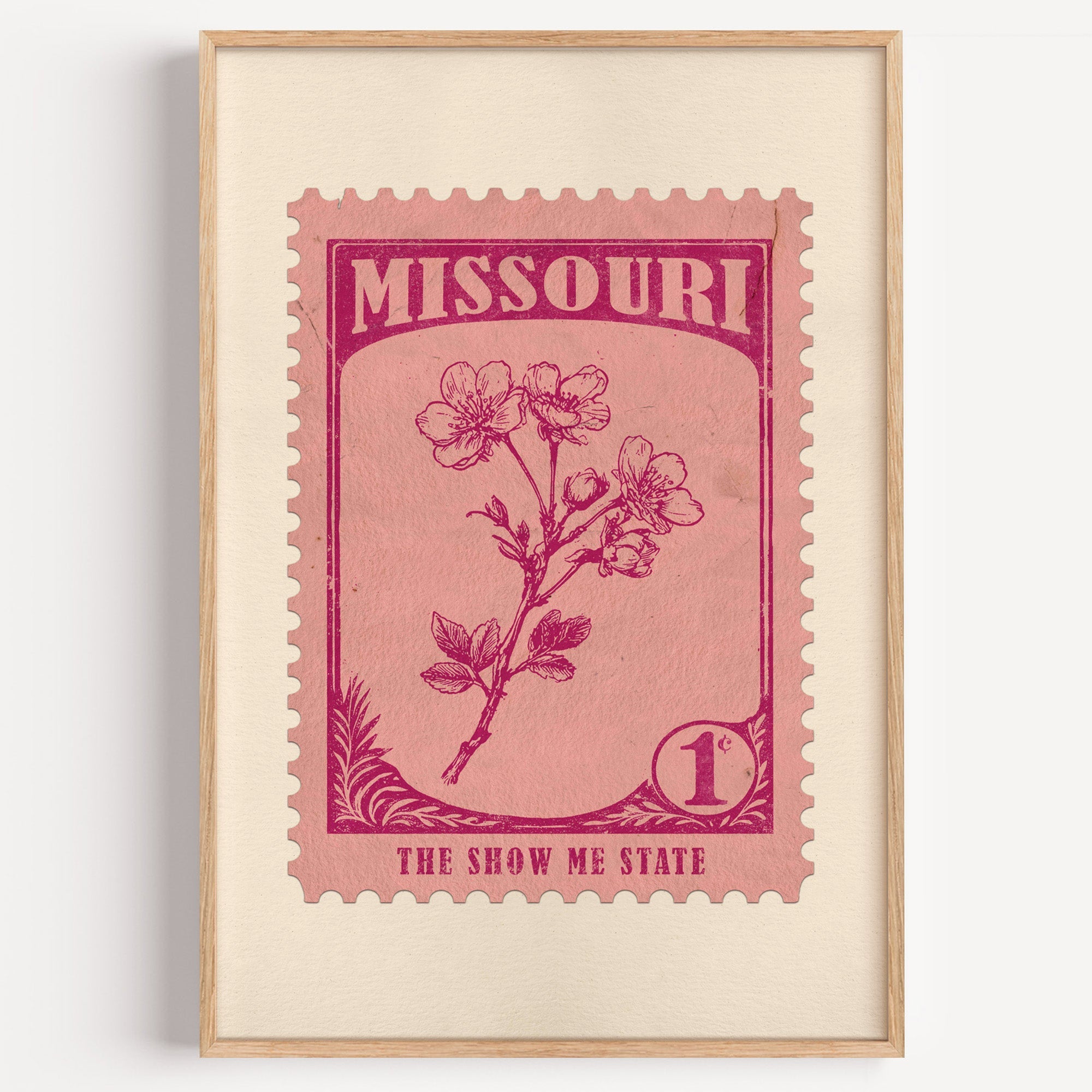 Missouri state flower stamp print in magenta on pink, light oak frame on a plain white wall