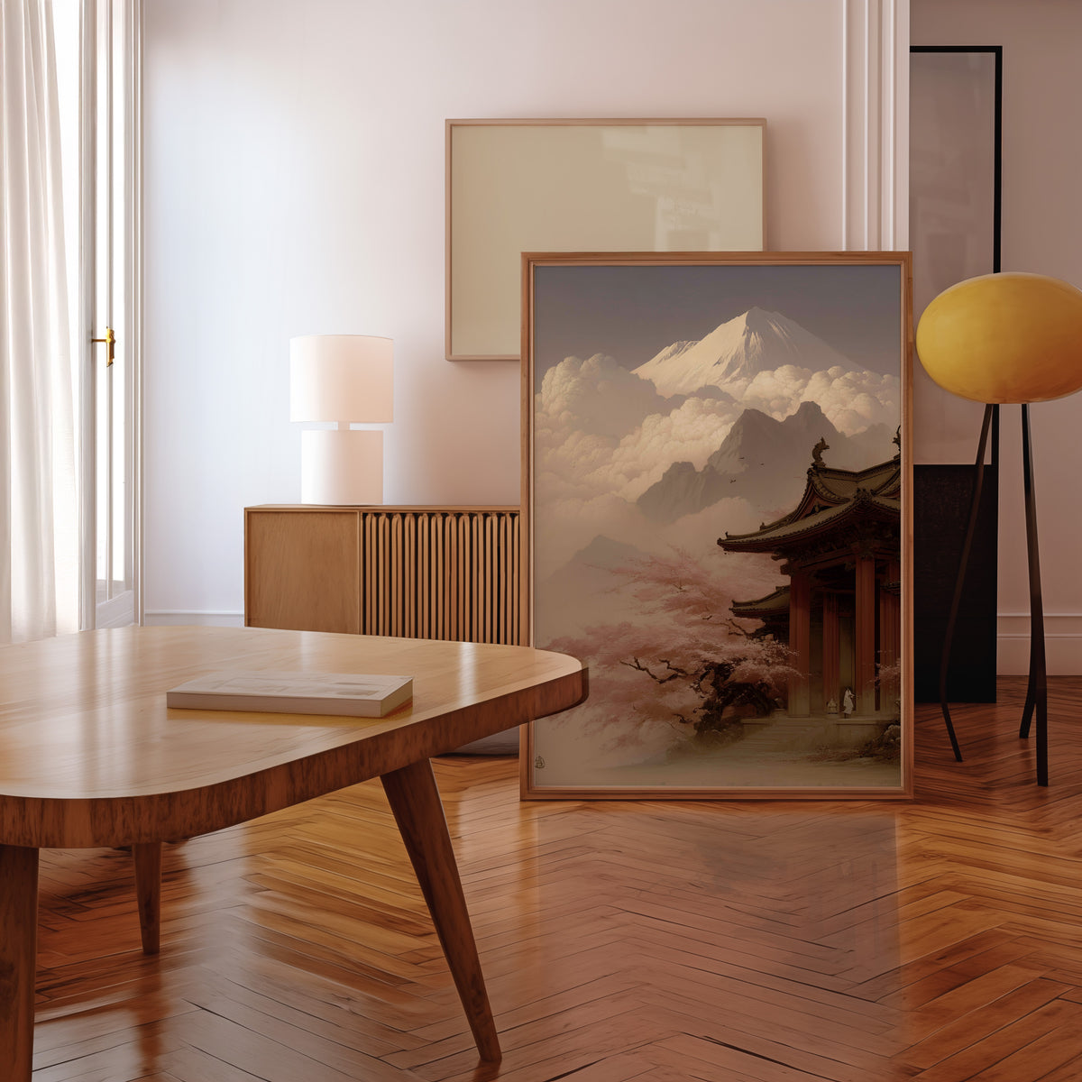 Misty sepia Mount Fuji temple print in a walnut frame leaning in a mid-century living room