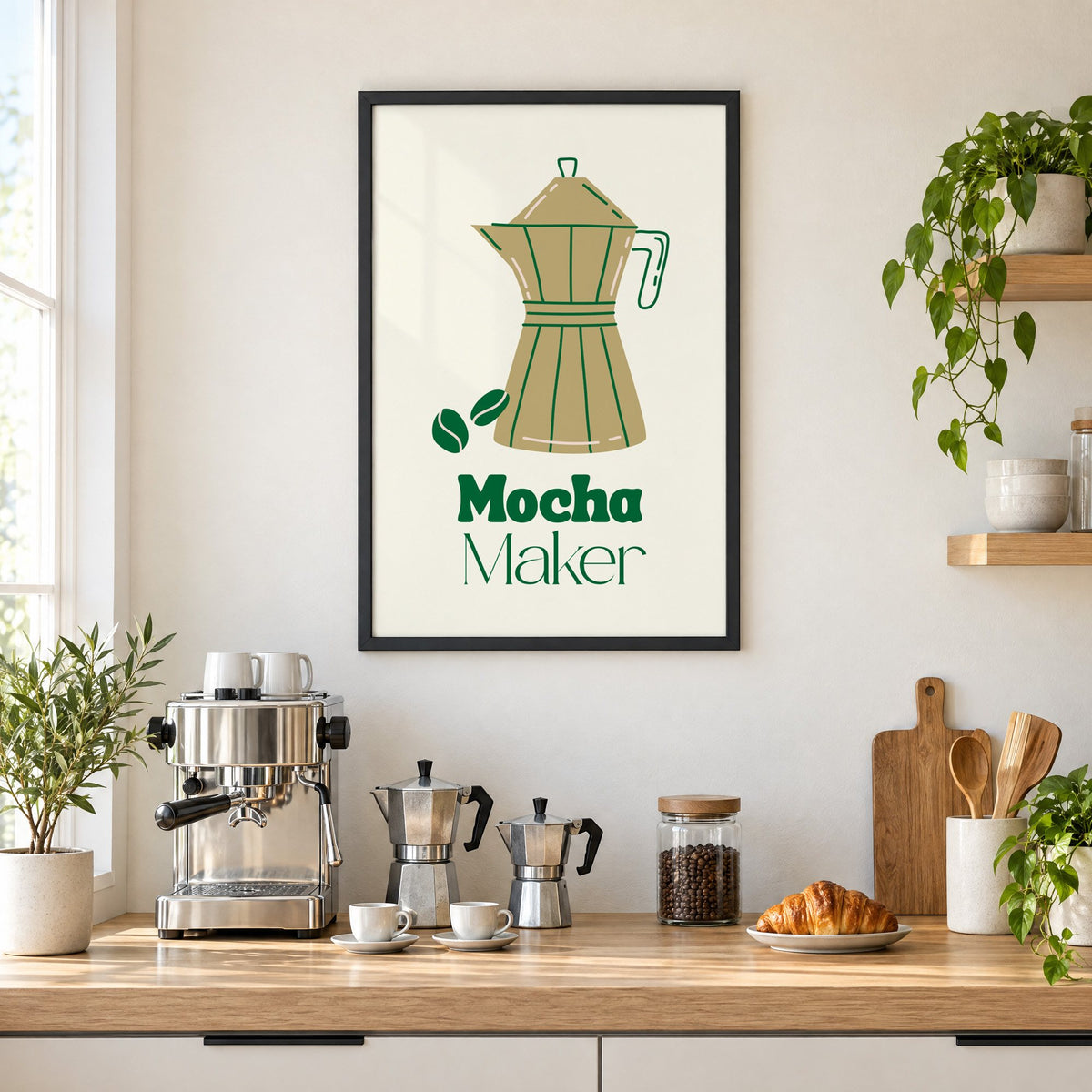Mocha Maker gold moka pot and beans print in a black frame above a home espresso bar with moka pots and espresso cups