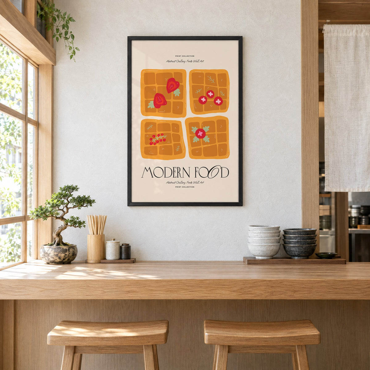 MODERN FOOD four berry waffles print in a black frame above a light wood ramen counter with stools and stacked bowls