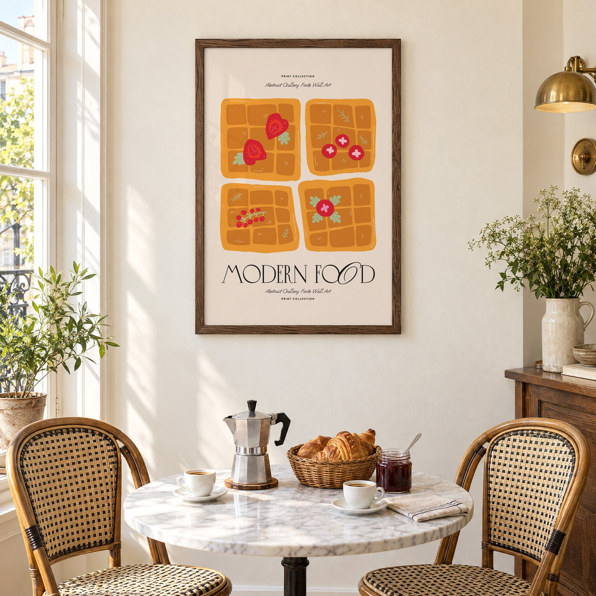 MODERN FOOD four berry waffles print in a walnut frame above a marble bistro table with croissants and rattan chairs