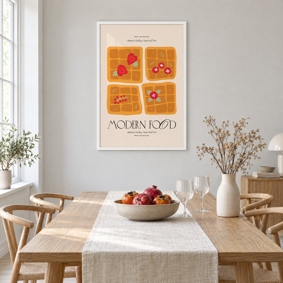 MODERN FOOD four berry waffles print in a white frame above a light oak dining table with a linen runner and fruit bowl