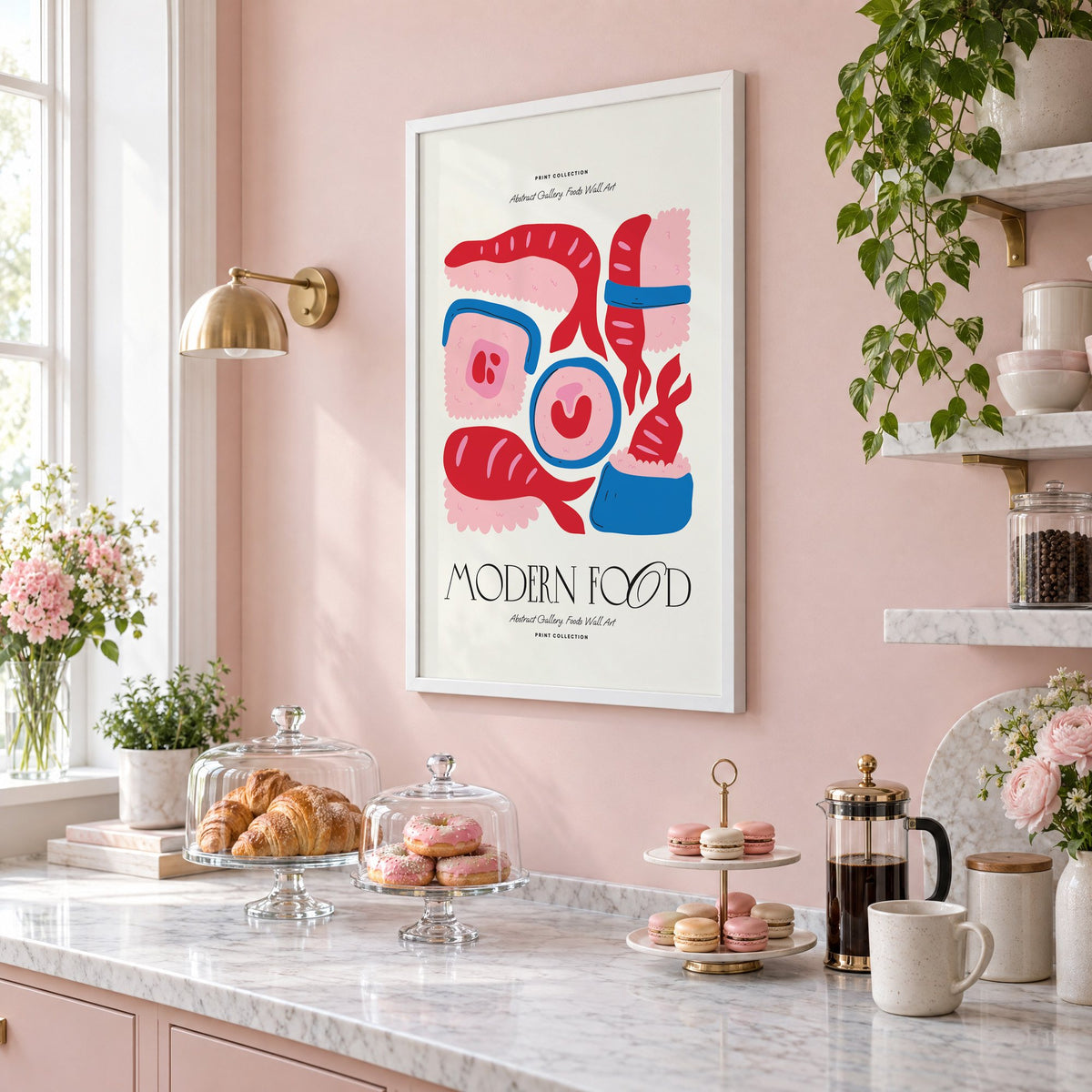 MODERN FOOD sushi nigiri maki print in a white frame on a blush pink wall above a patisserie counter with croissants and macarons, seen at an angle