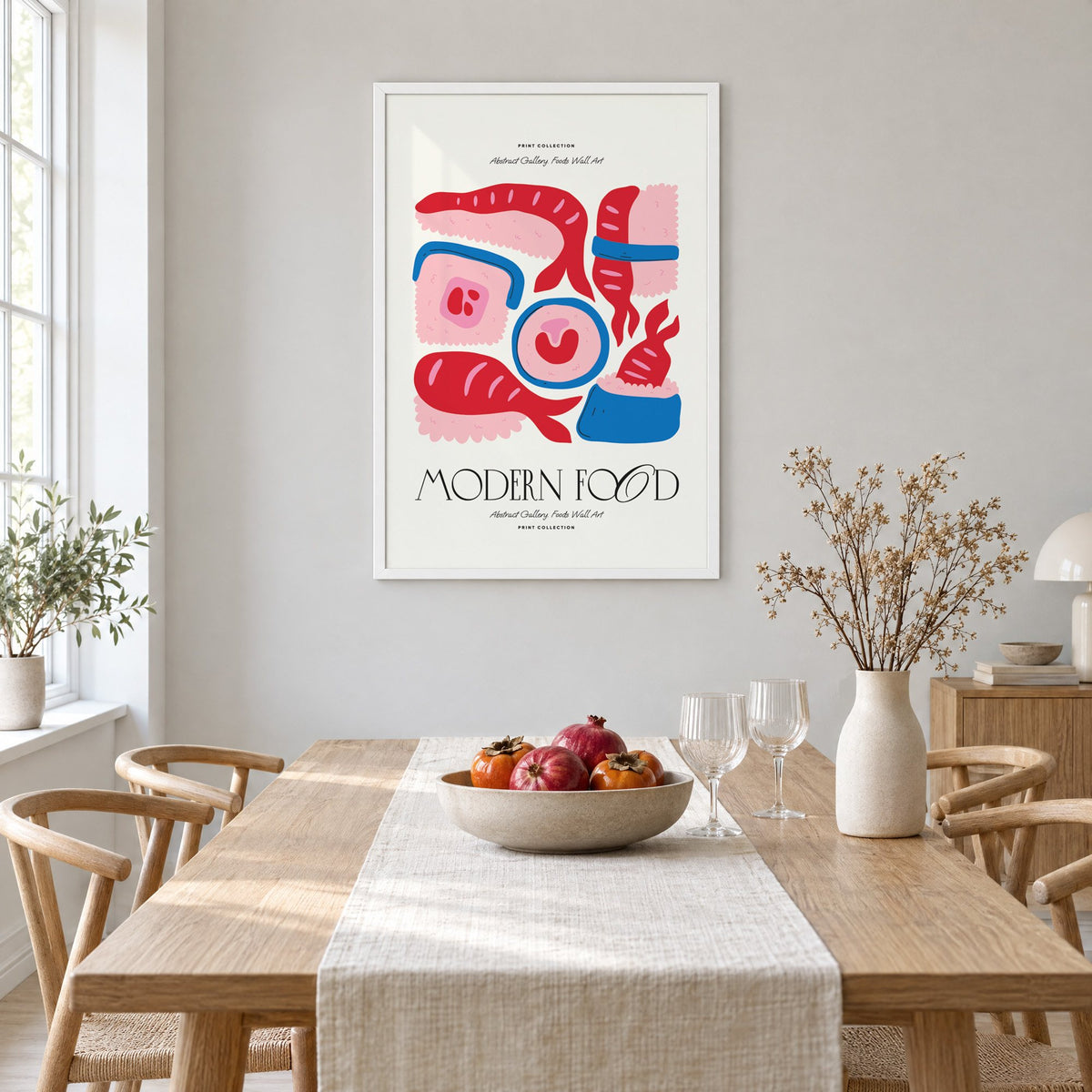 MODERN FOOD sushi nigiri maki print in a white frame above a light oak dining table with a linen runner and fruit bowl